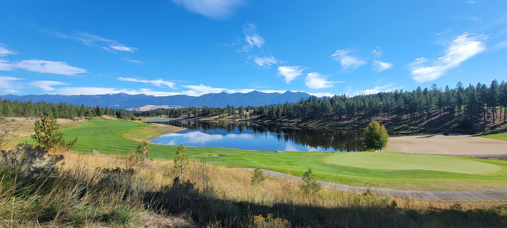 Enjoy the views of the Whitefish Range and the 18th hole from the back deck