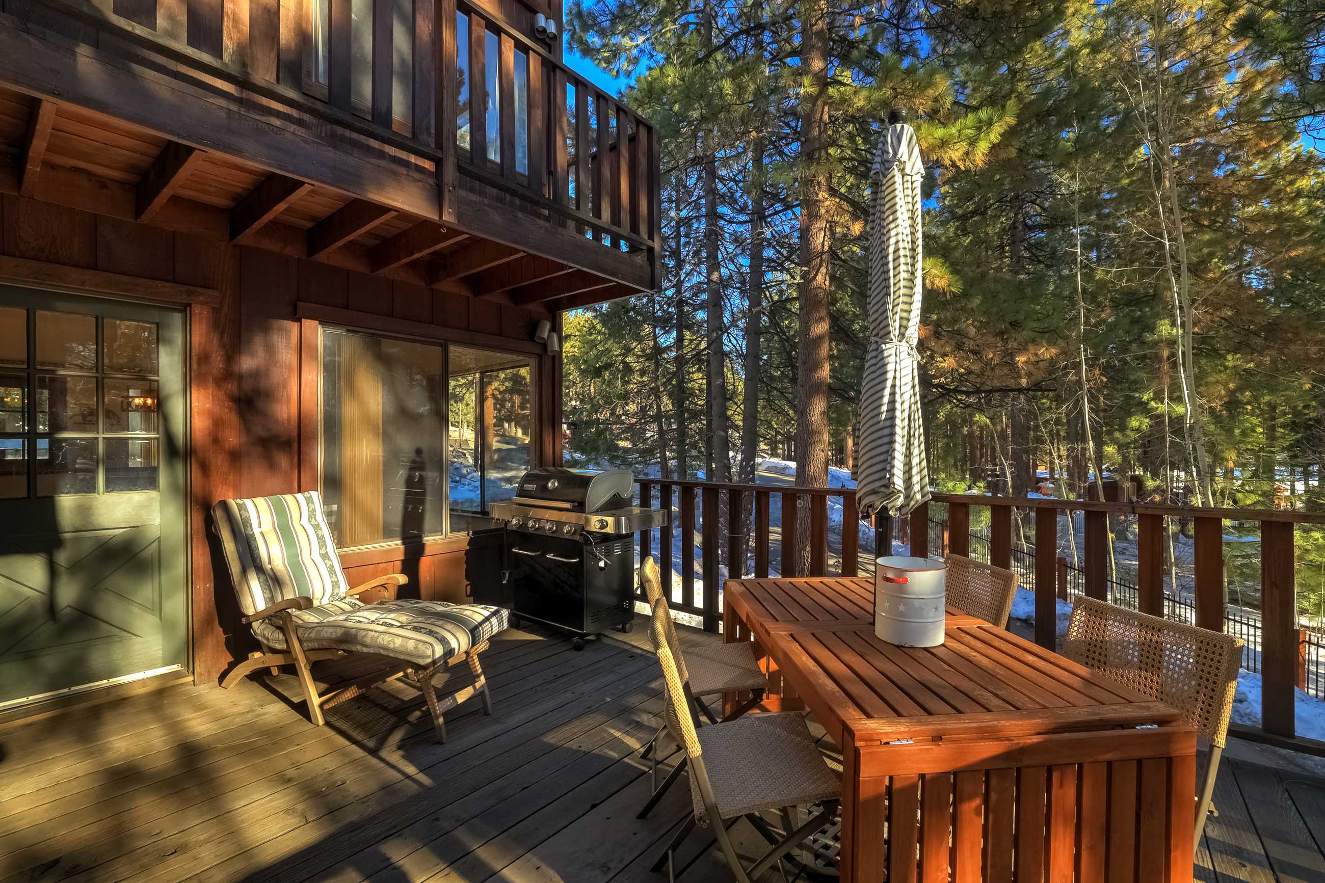 Main floor deck with BBQ, and seating