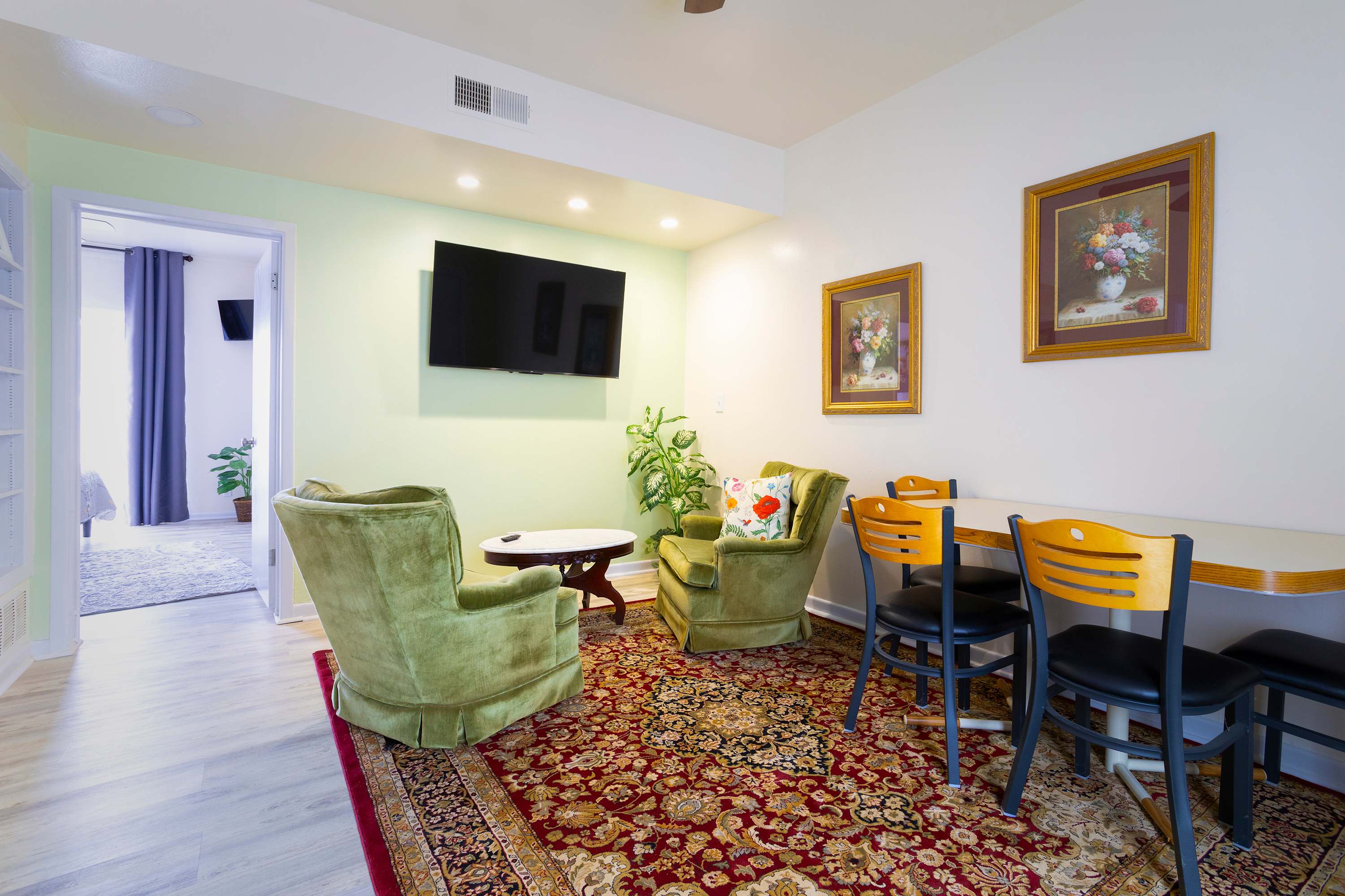 Settle into a cozy chair or enjoy a meal while you watch the smart TV