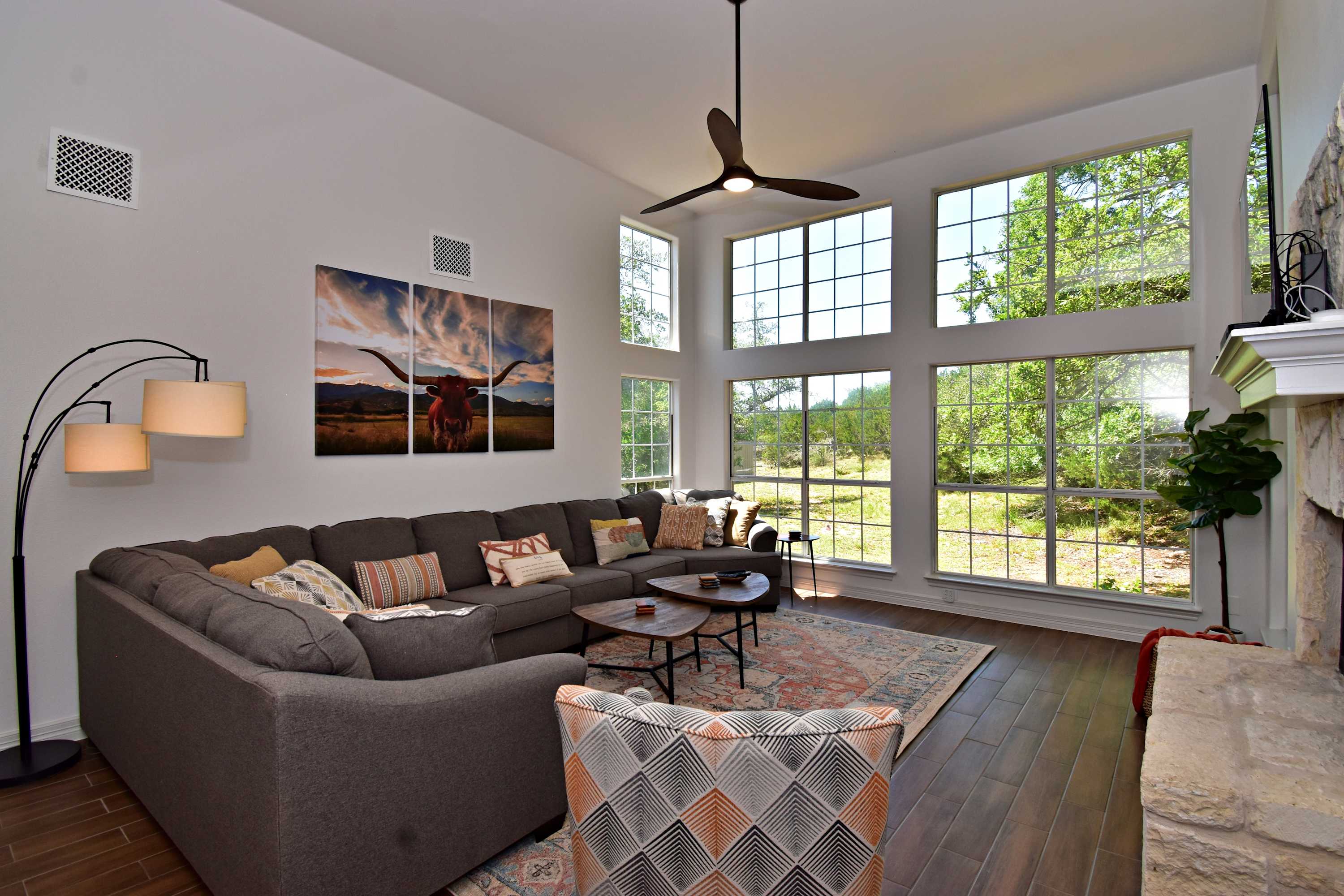 Curl up in the airy living room & enjoy a movie night in style