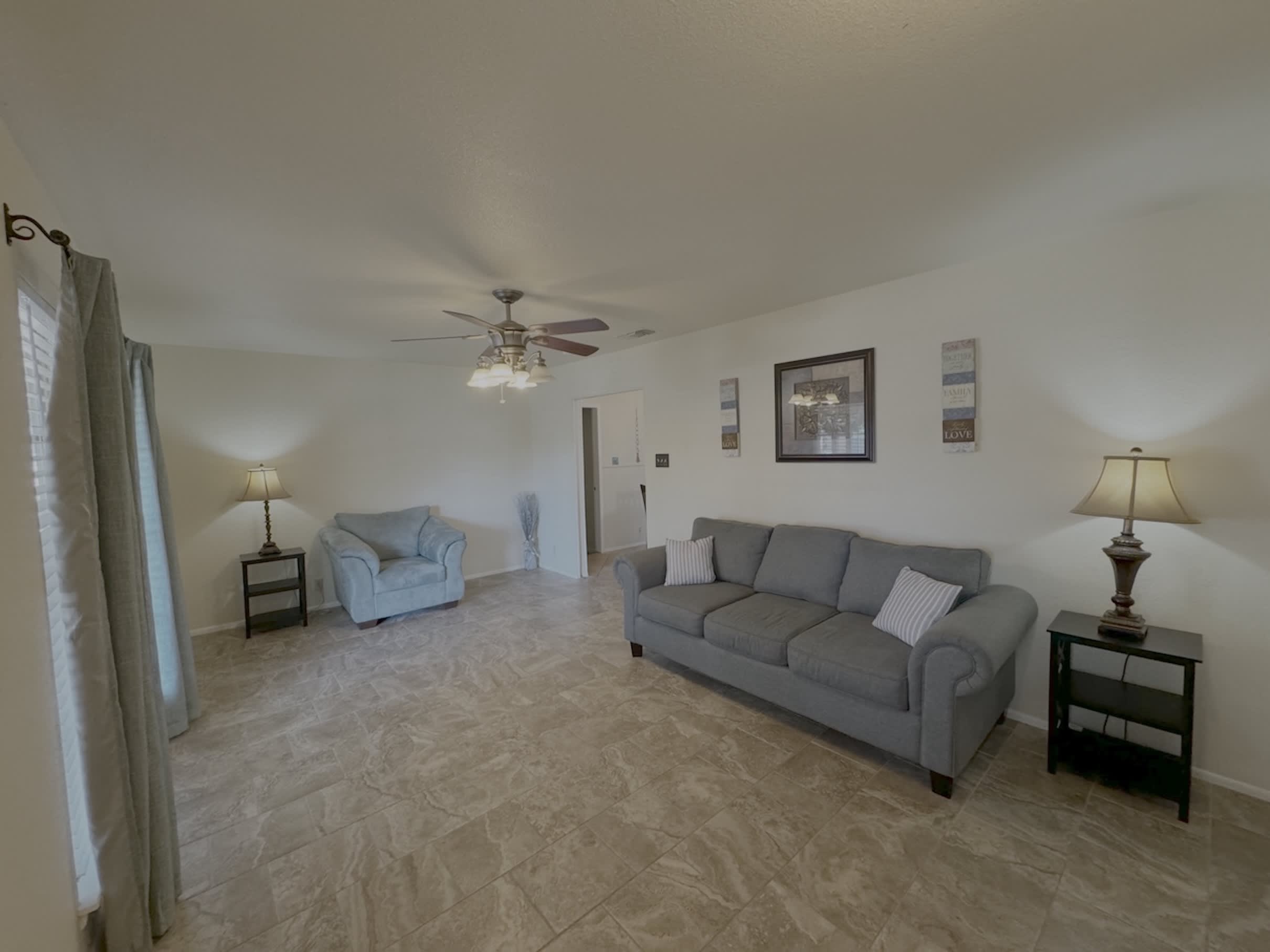 Curl up in the serene living room & enjoy a great book