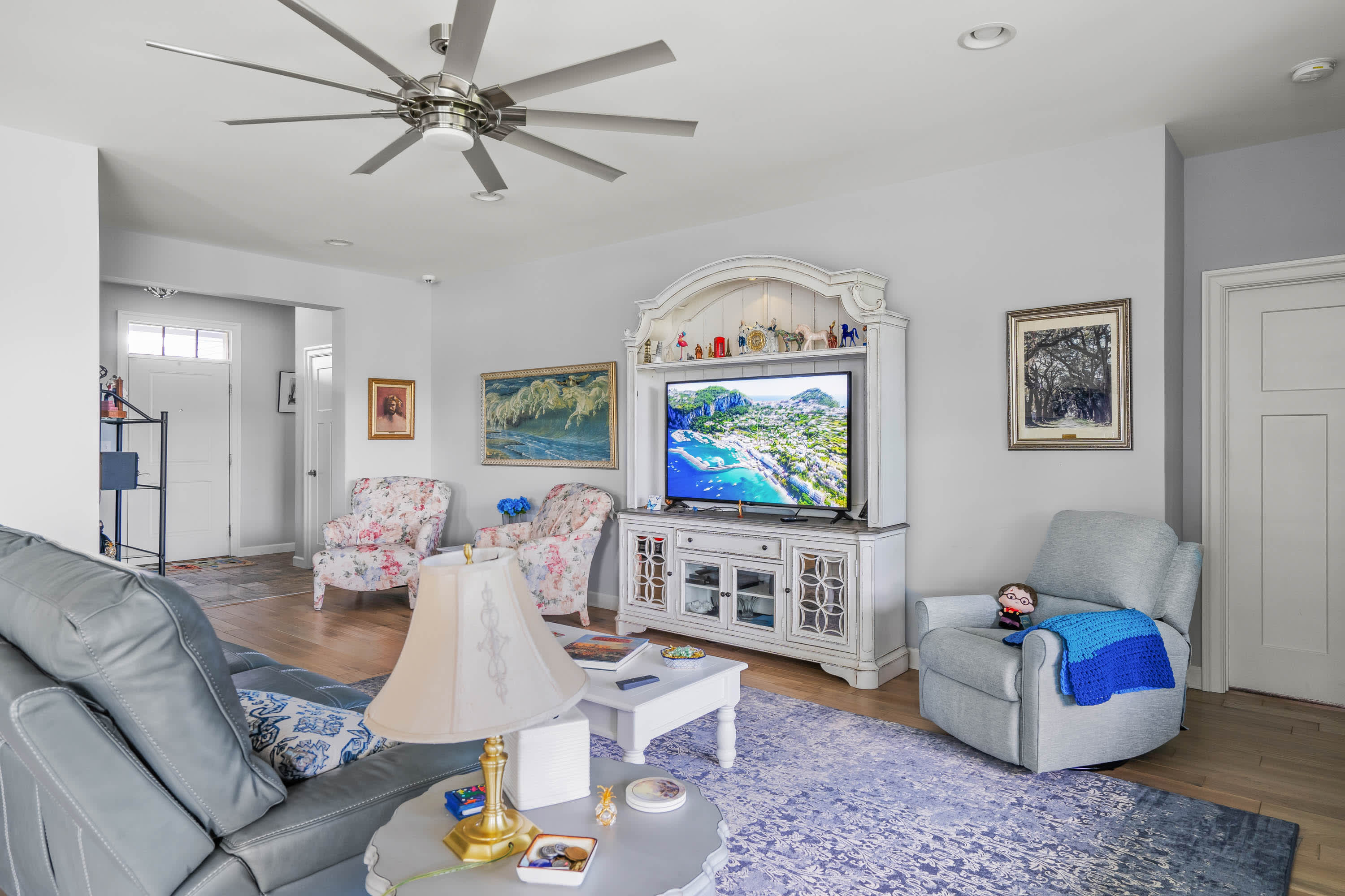 Cozy and spacious living area with TV