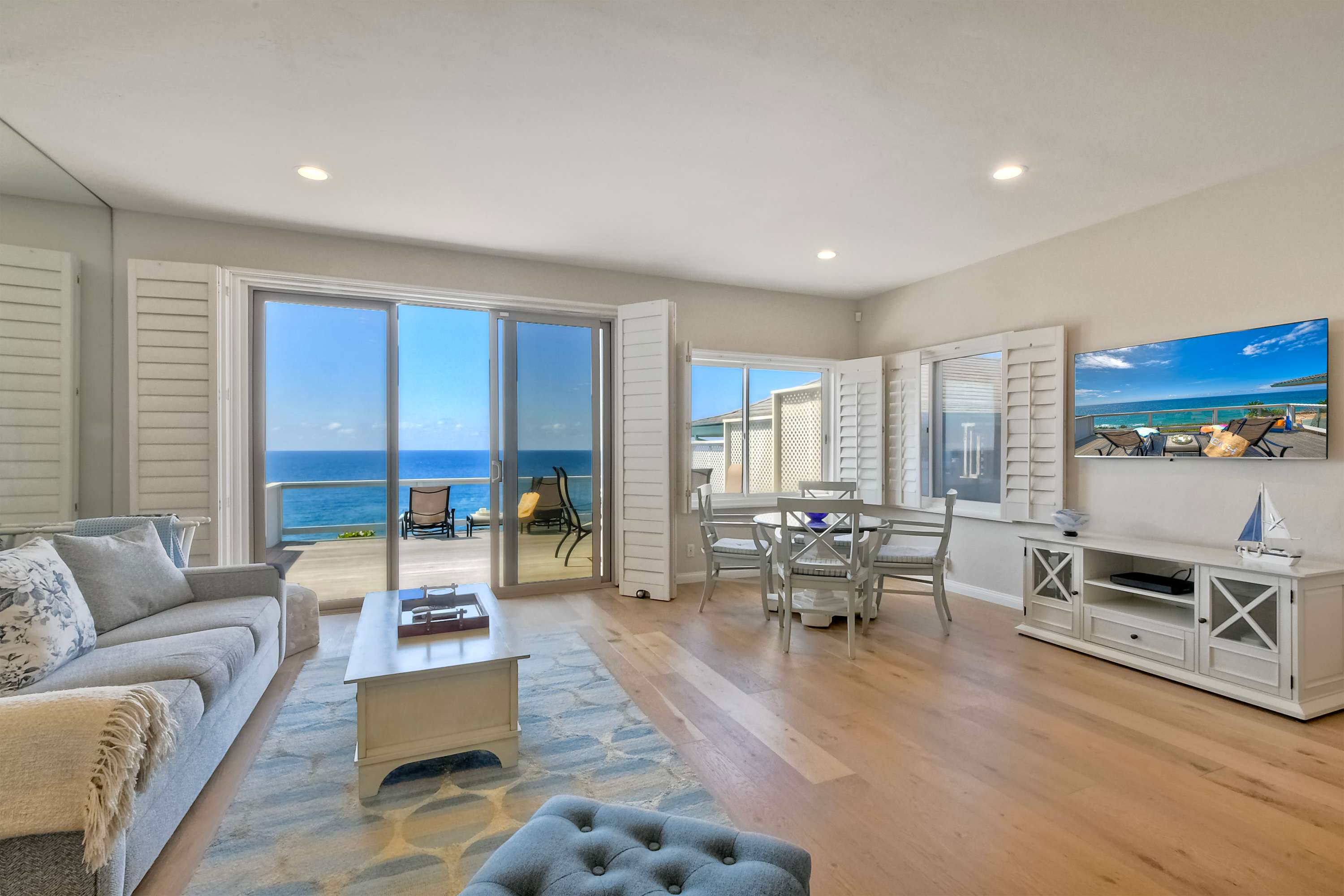 Curl up in the breezy living room & enjoy streaming with a stunning view