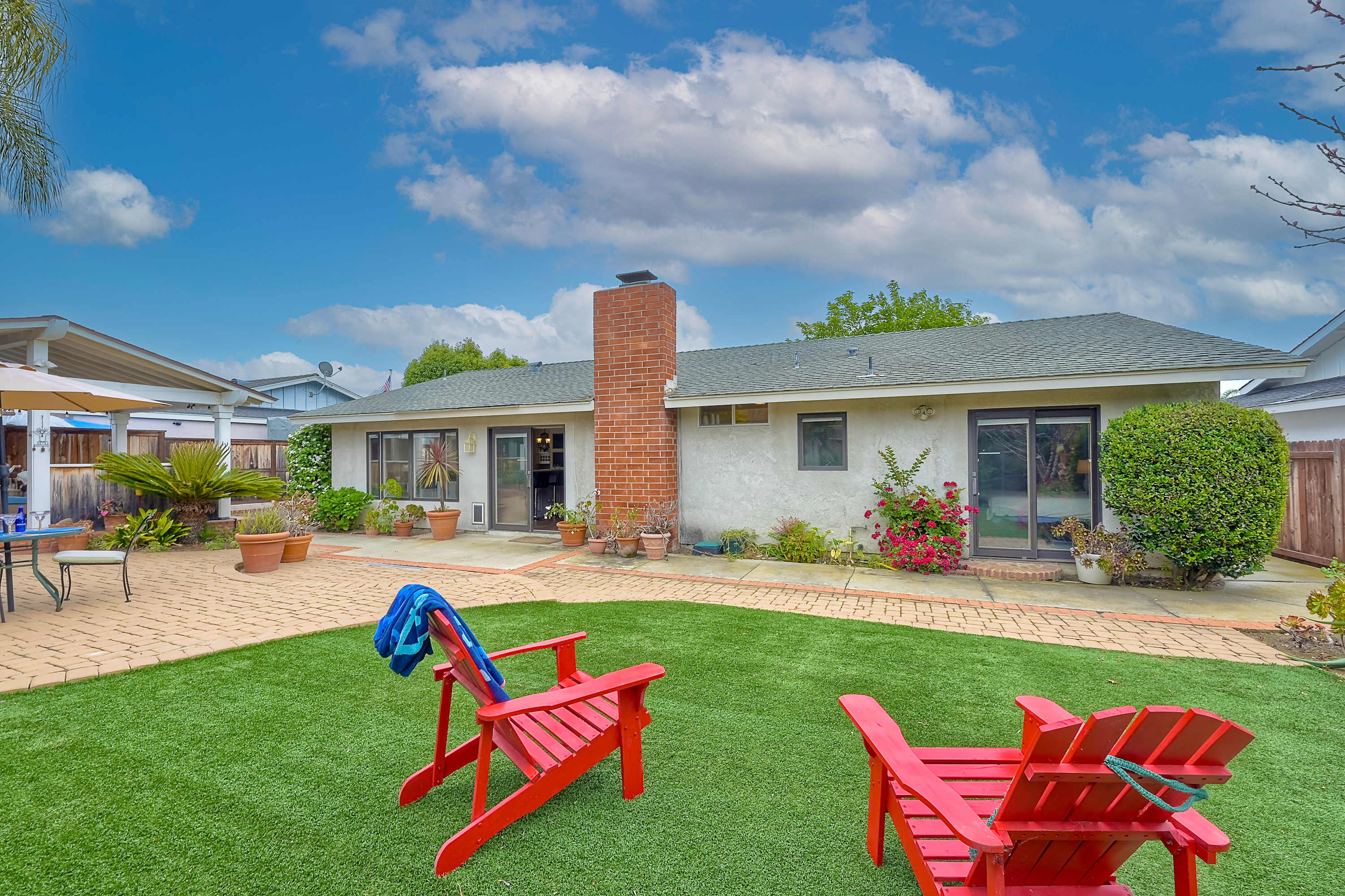 Experience serenity in the backyard oasis, ideal for gatherings & alfresco dining