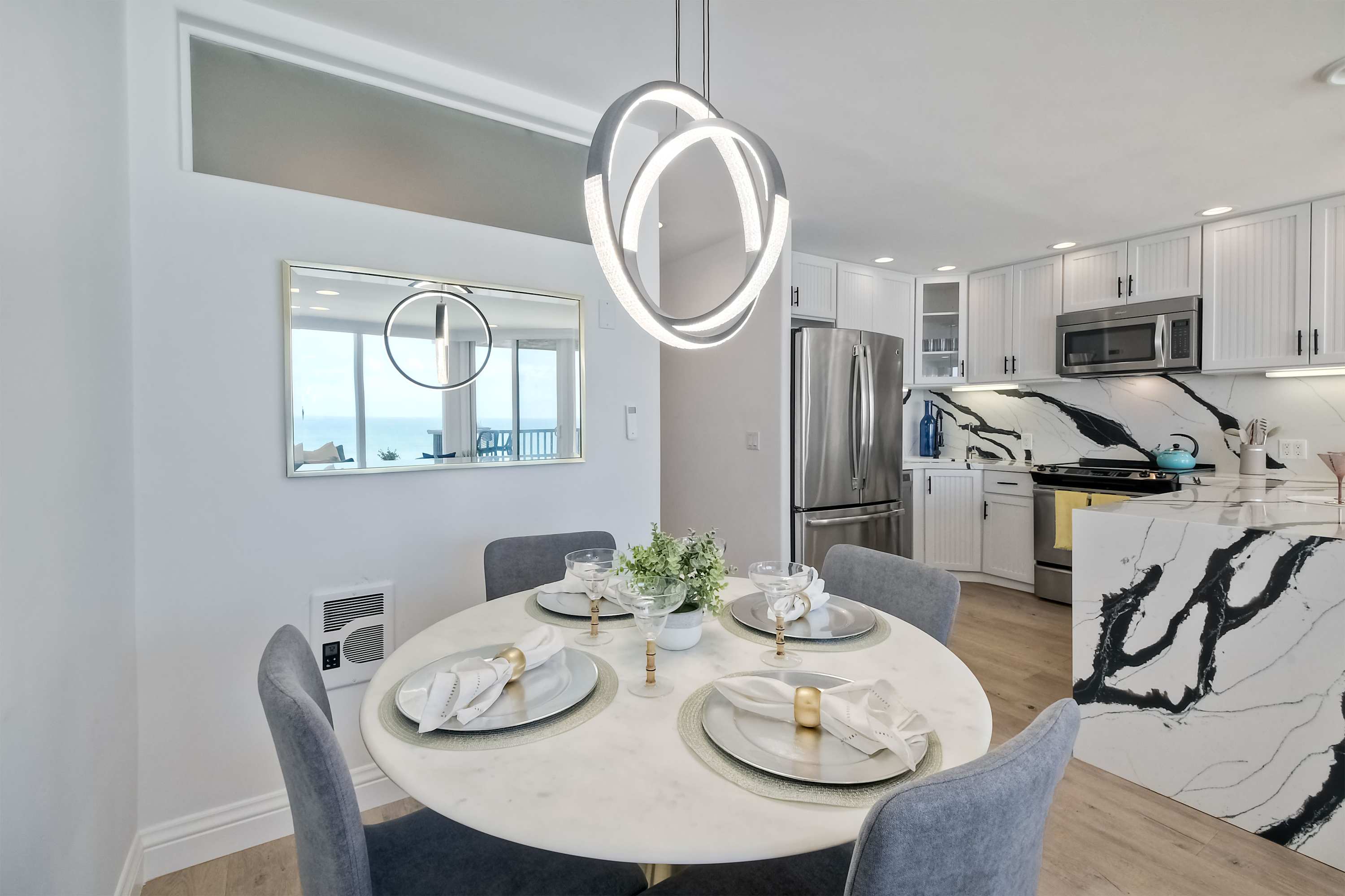 Gather for elegant meals together at the dining table, with seating for 4