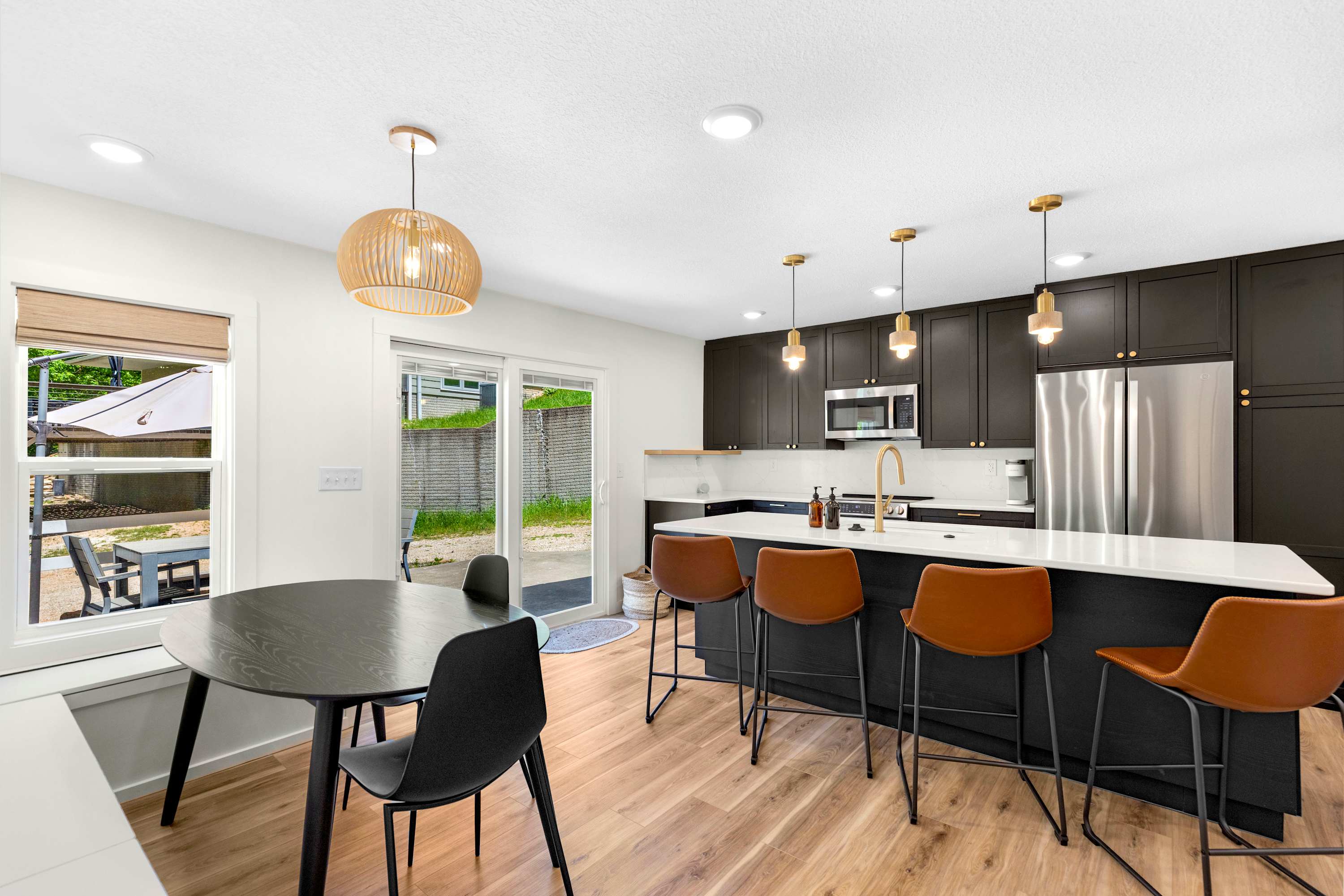 The cozy, open kitchen offers ample space & all the comforts of home