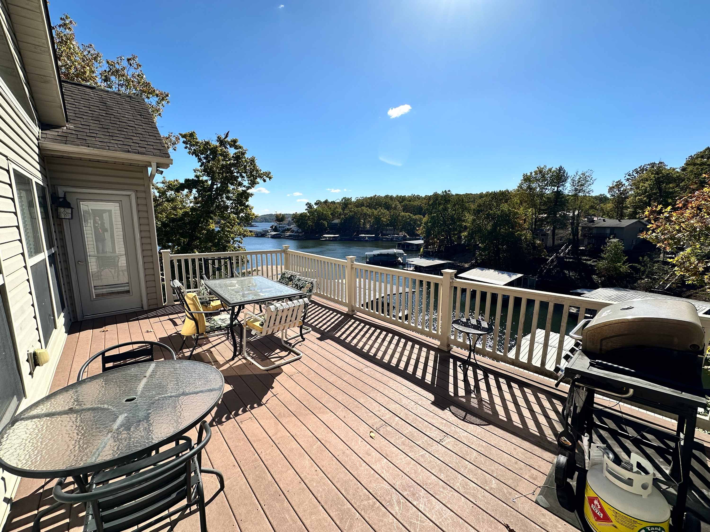 Experience outdoor relaxation with a spacious deck and beautiful lake views