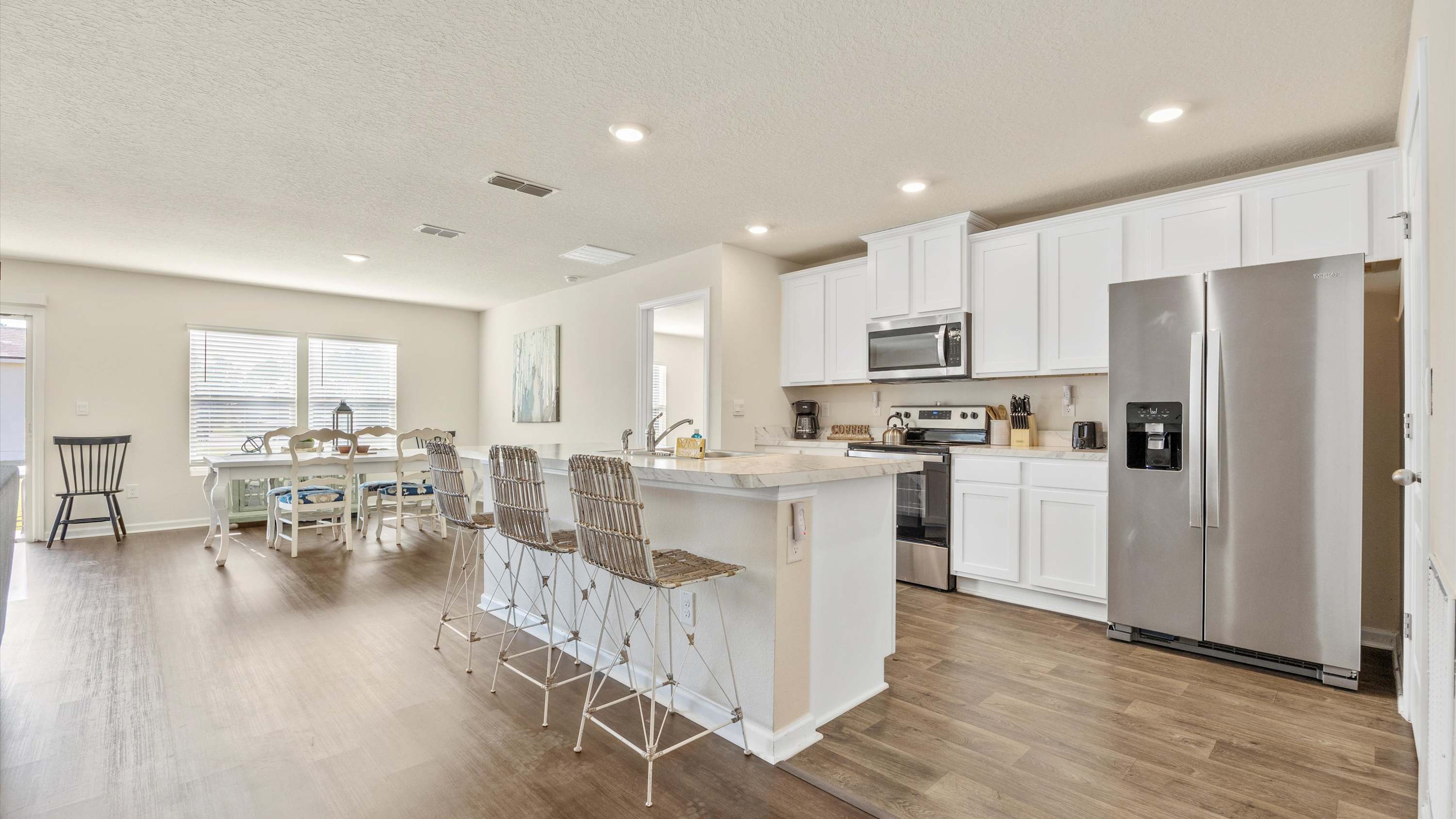 Sip morning coffee or grab a bite at the kitchen counter, with seating for 3