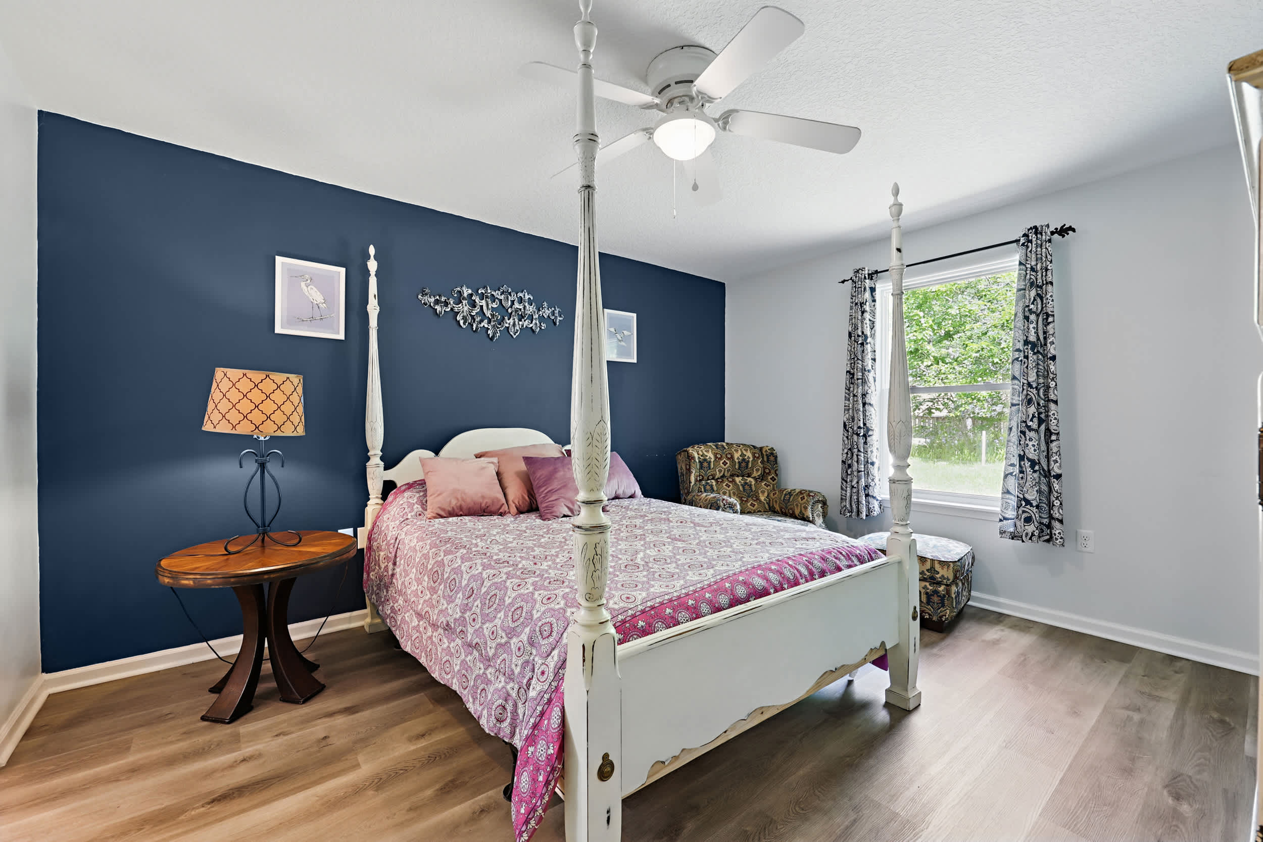 The serene queen suite boasts a smart TV & ensuite bath