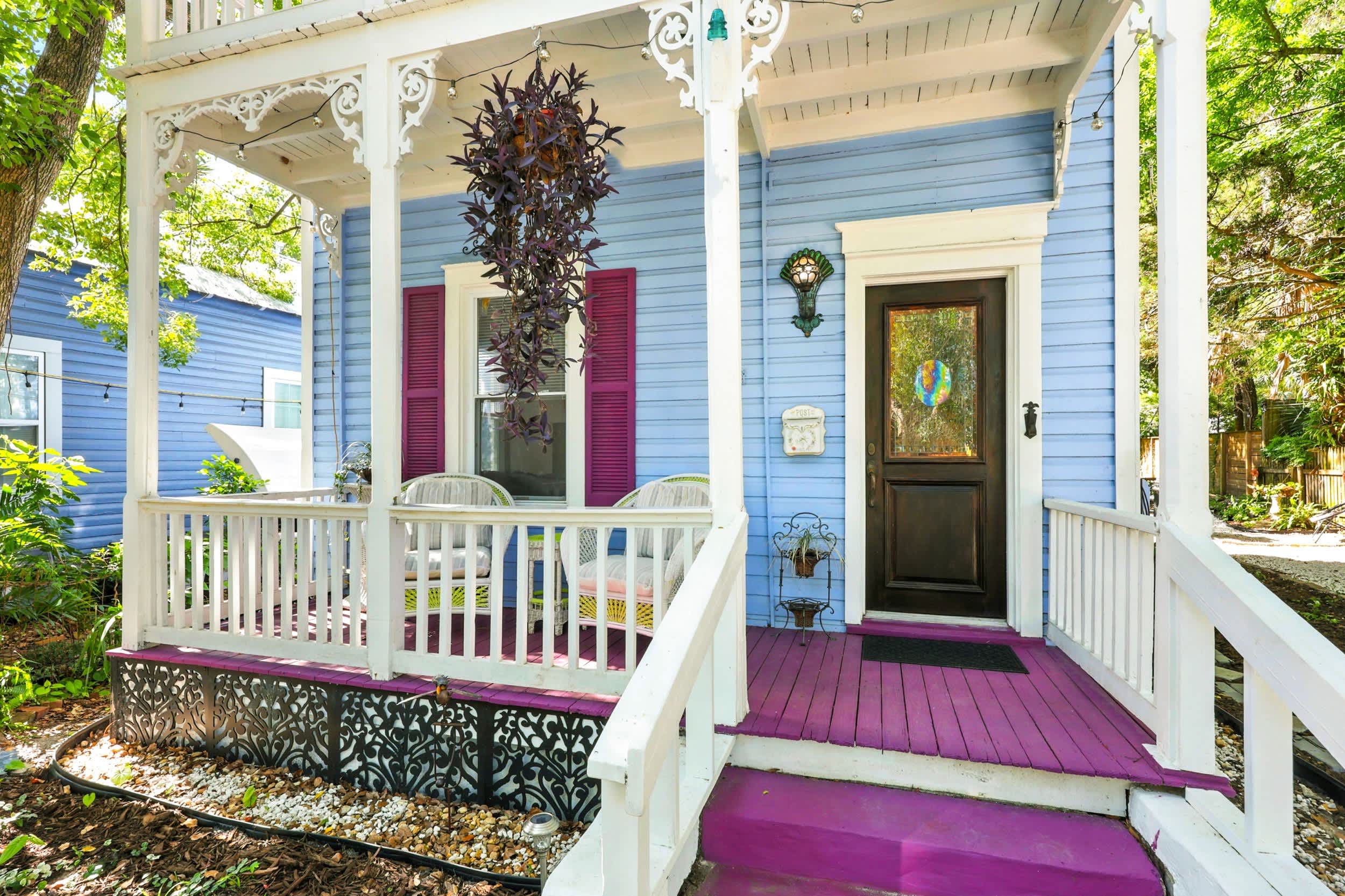 Porch with seating and lush view