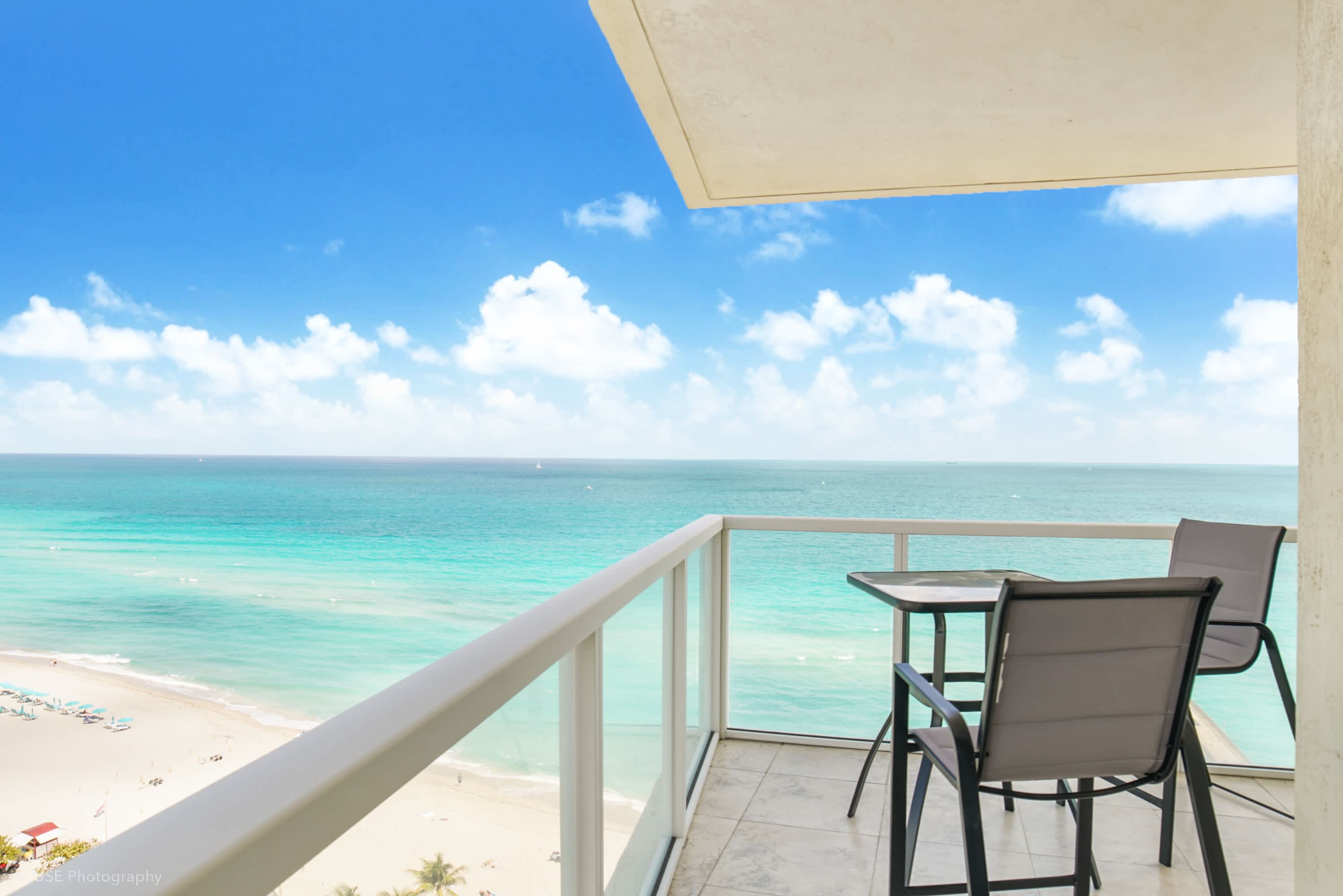 Featured Property Balcony on the Ocean - Luxury beachfront condo for 4