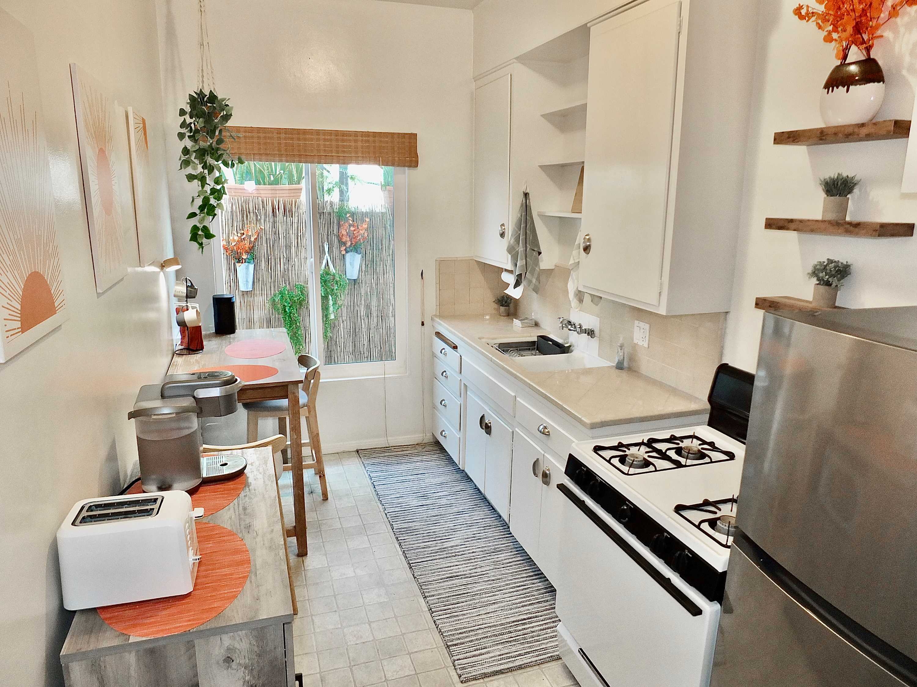 The cozy kitchen offers ample storage space & all the comforts of home