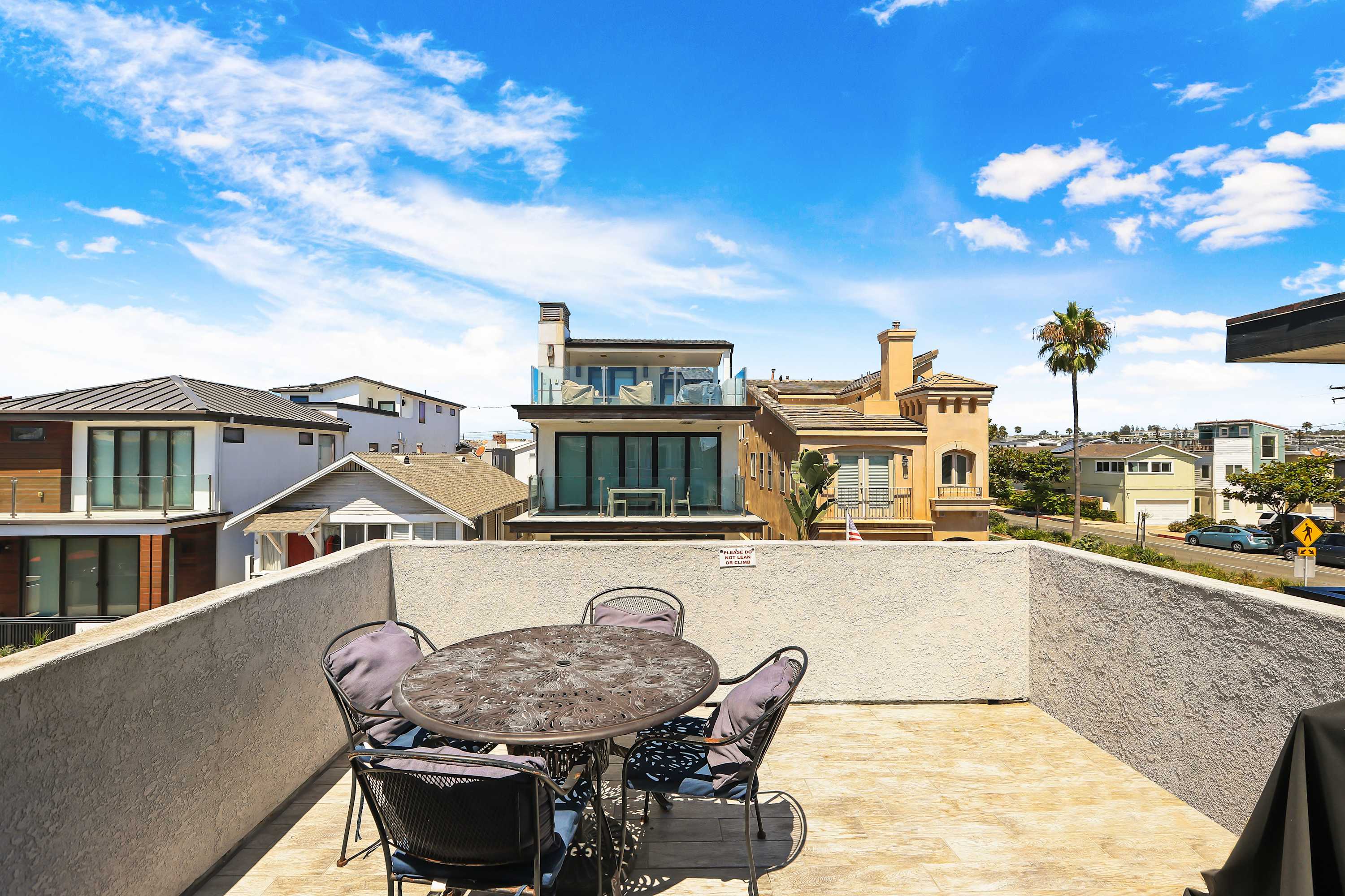 Lounge the day away with partial ocean views on the rooftop deck!