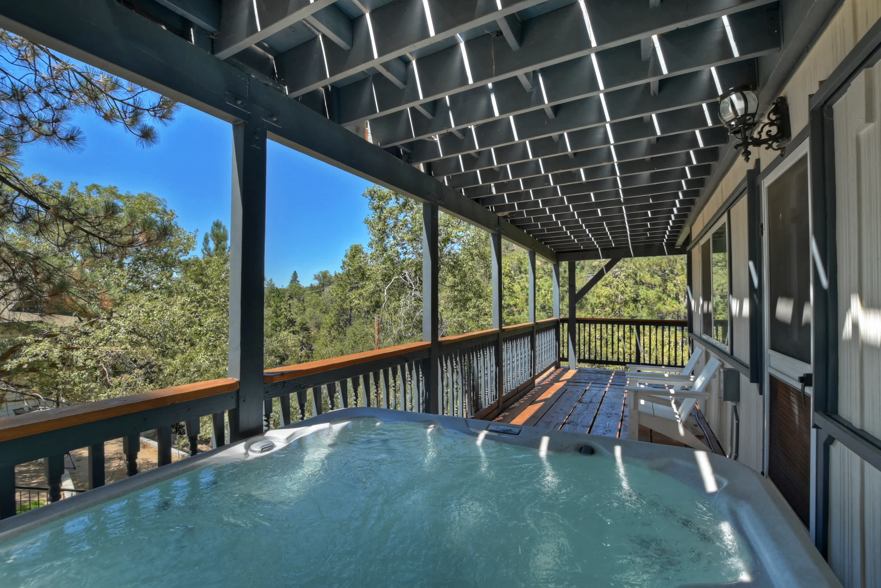 Relax and unwind in the private hot tub on the deck.