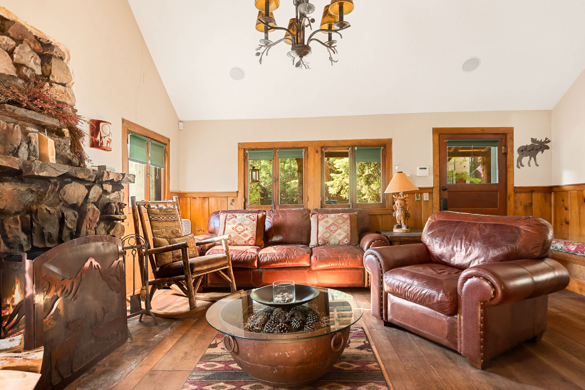 Open floor plan with the living room, dining room table, and kitchen.