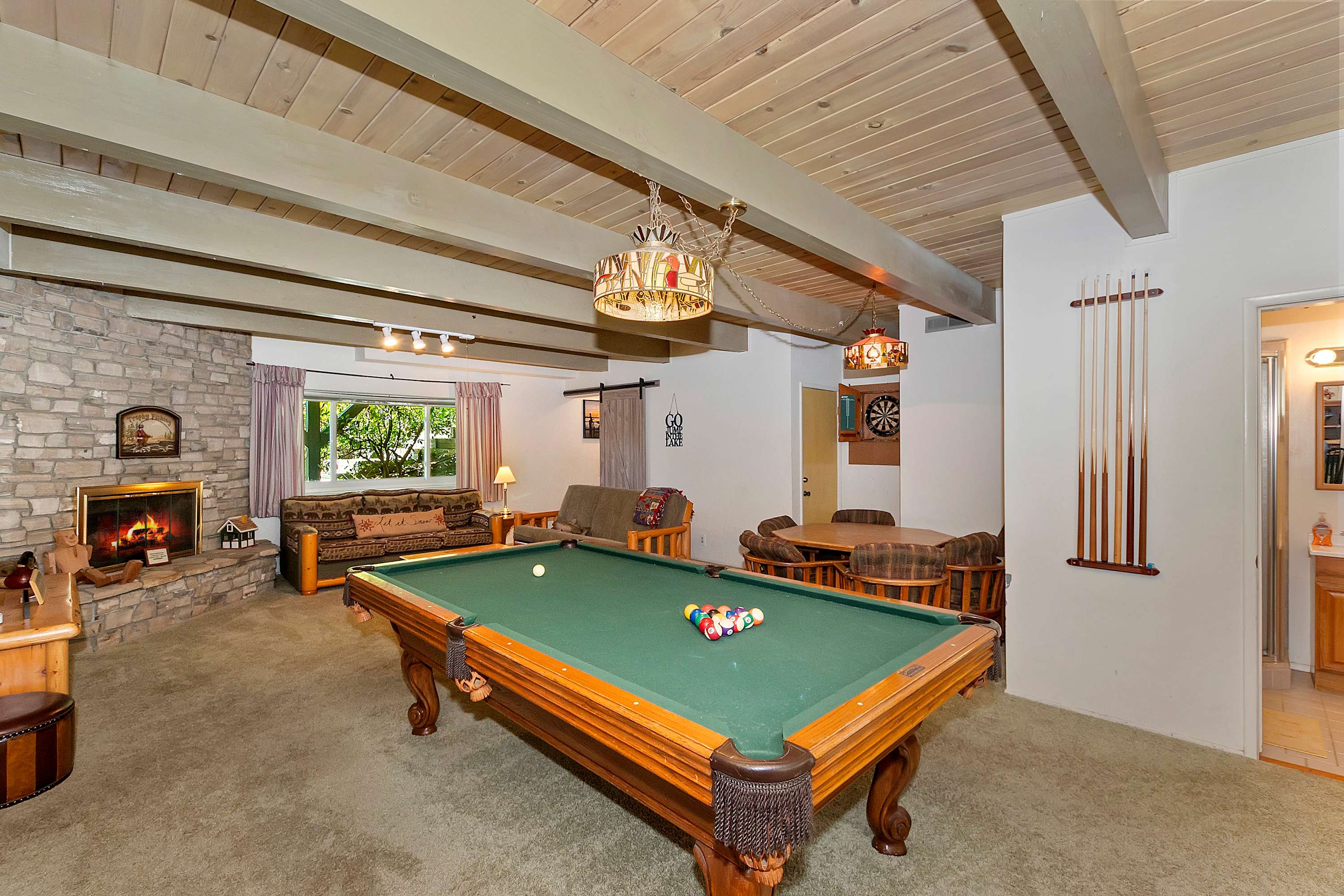 Lounge the day away or unleash your competitive side in the lower-level game room/den.