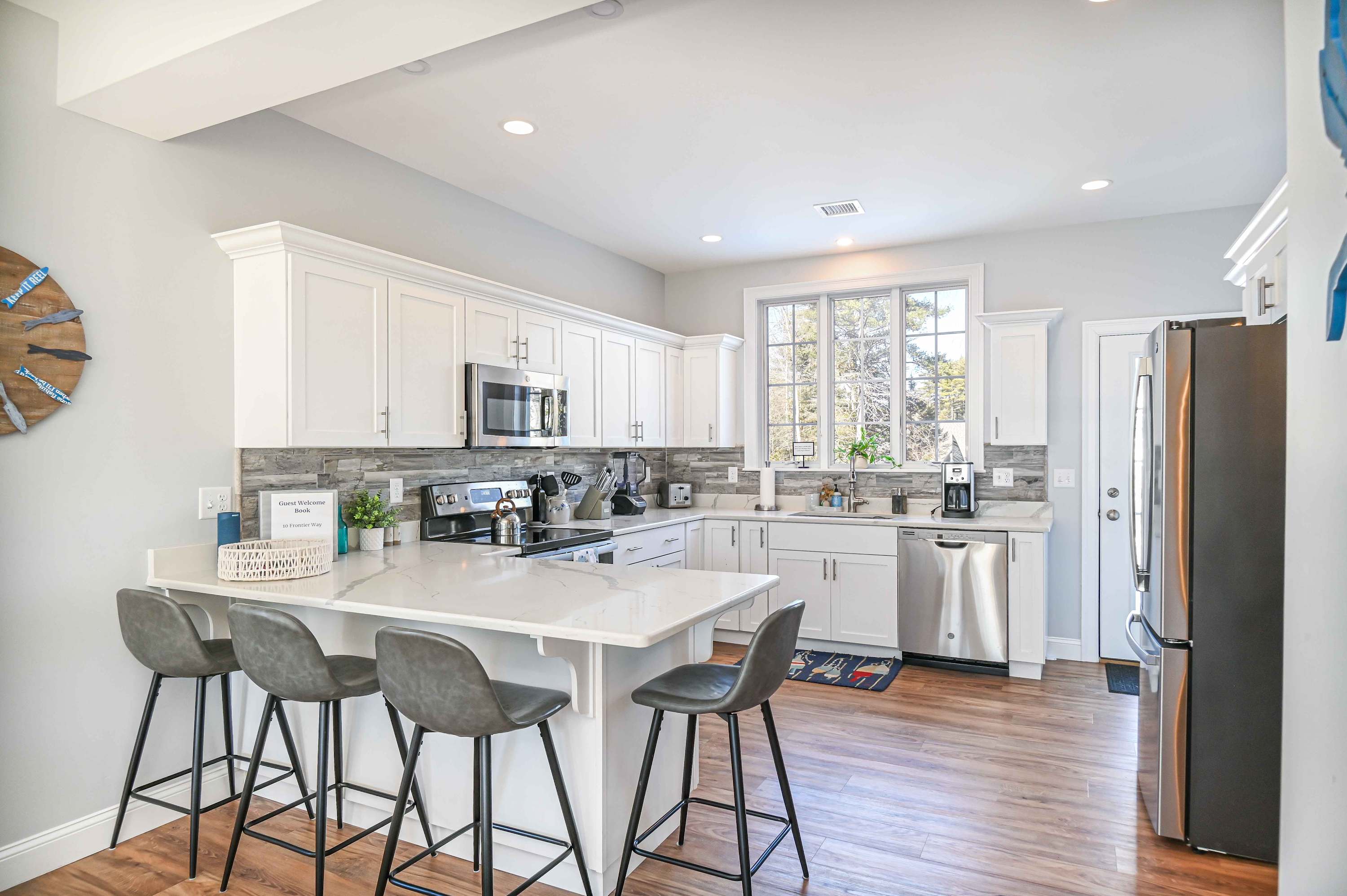 Sip morning coffee or grab a bite at the kitchen counter, with seating for 4