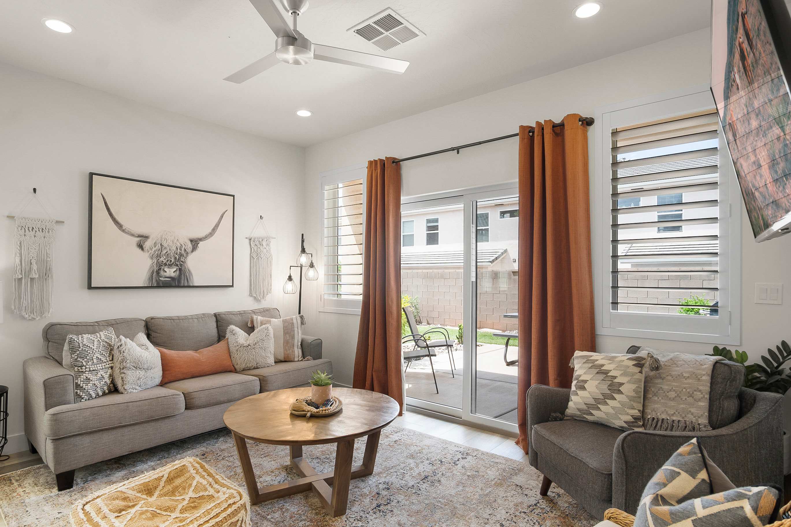 Cozy and spacious living area with TV