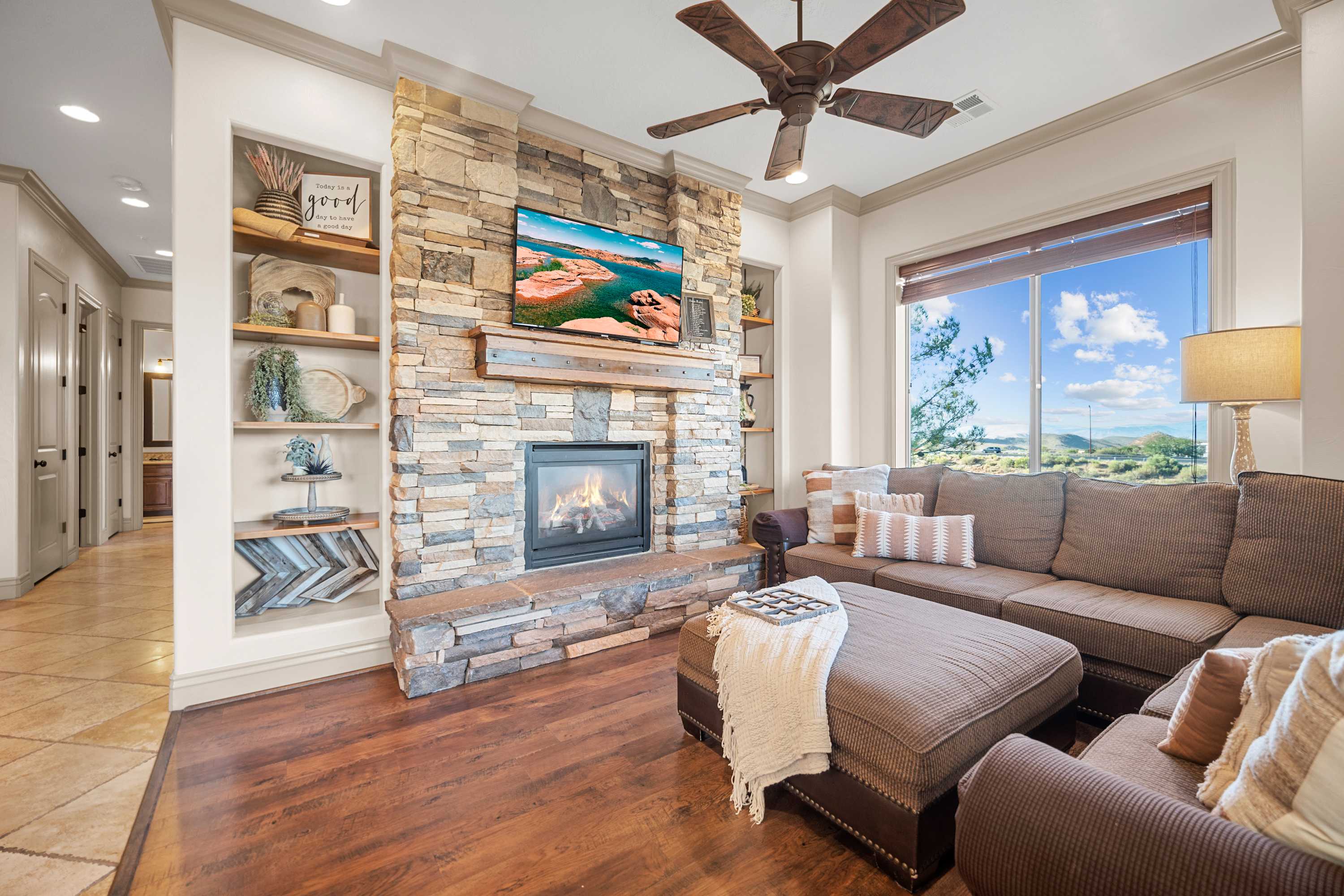 Beautiful decor, fireplace, smart tv, and comfy couch!
