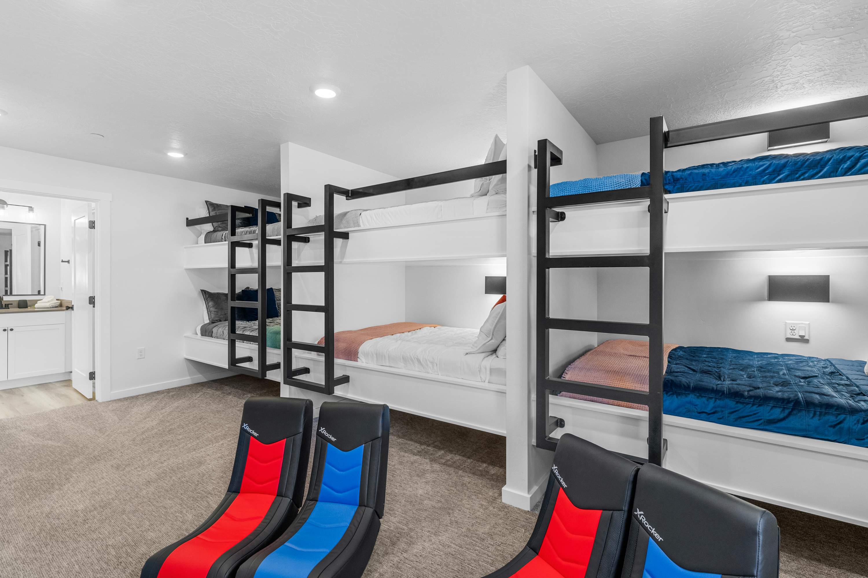 The final bedroom offers three full-over-full bunkbeds & a smart TV