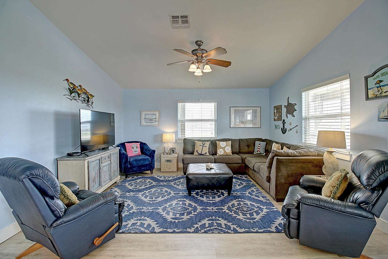 Bright open living space with ample seating, and Smart TV