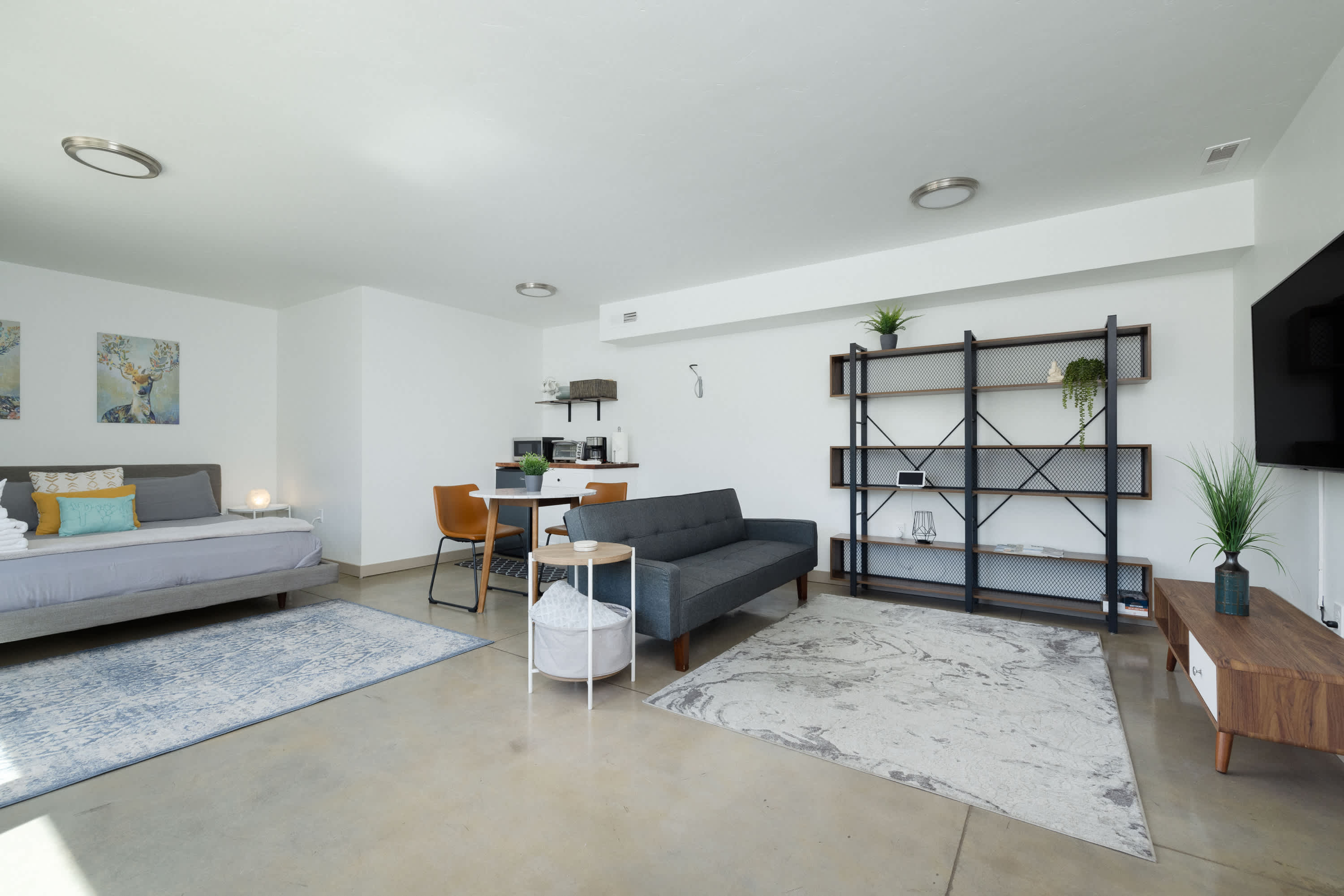 Studio with Smart TV, king bed, and kitchenette