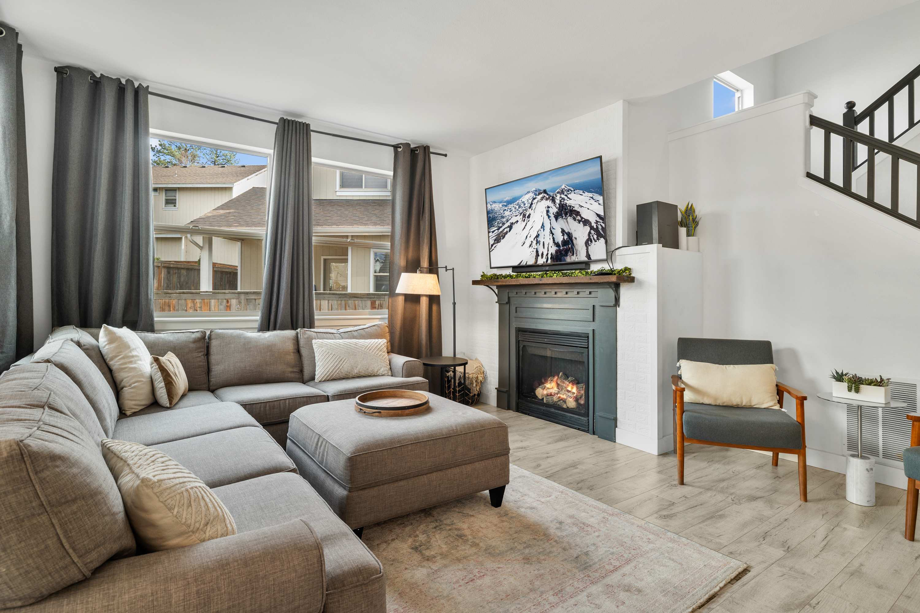 Curl up in the cozy living room & enjoy a movie by the fire