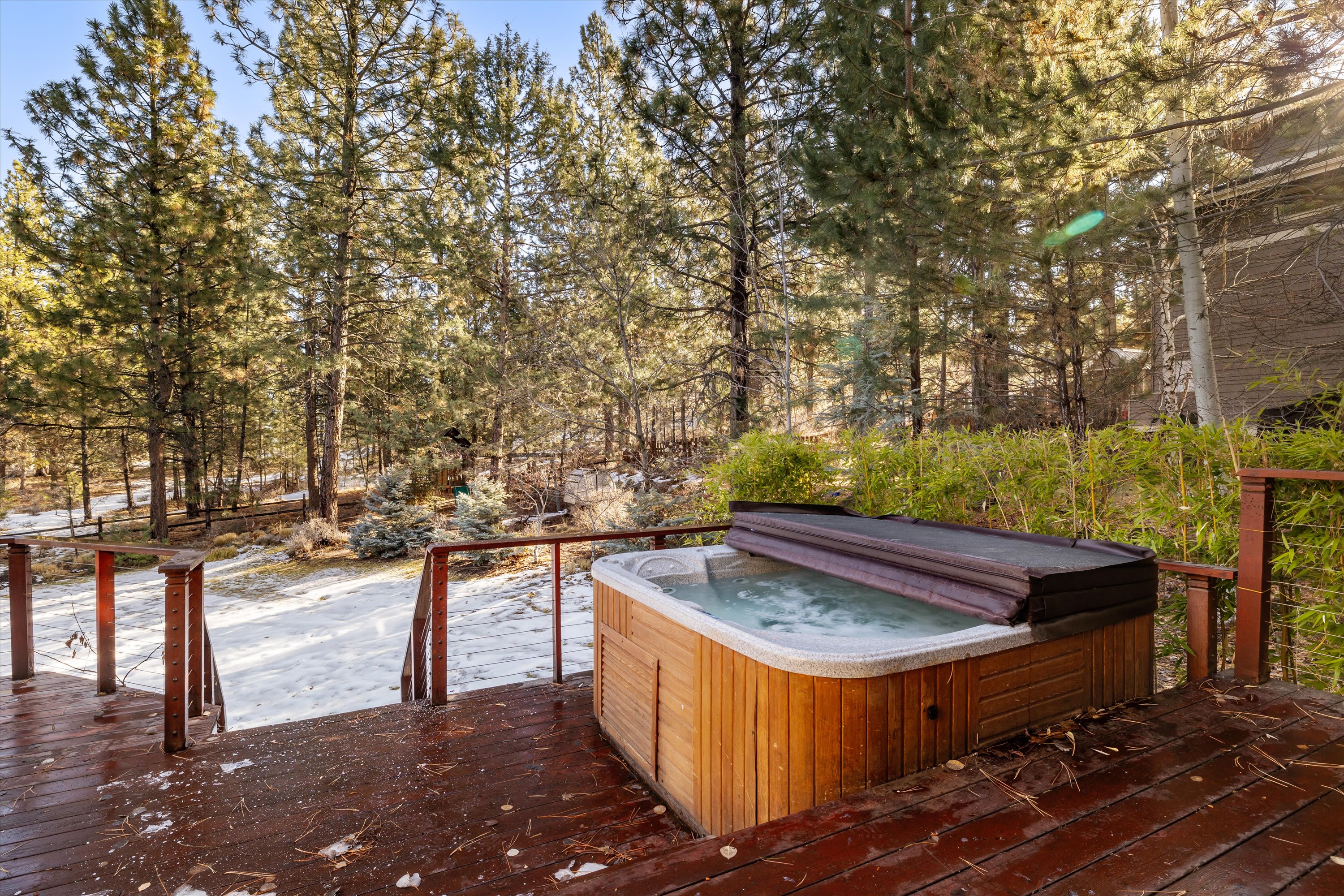 Enjoy the private hot tub after a day of adventures!