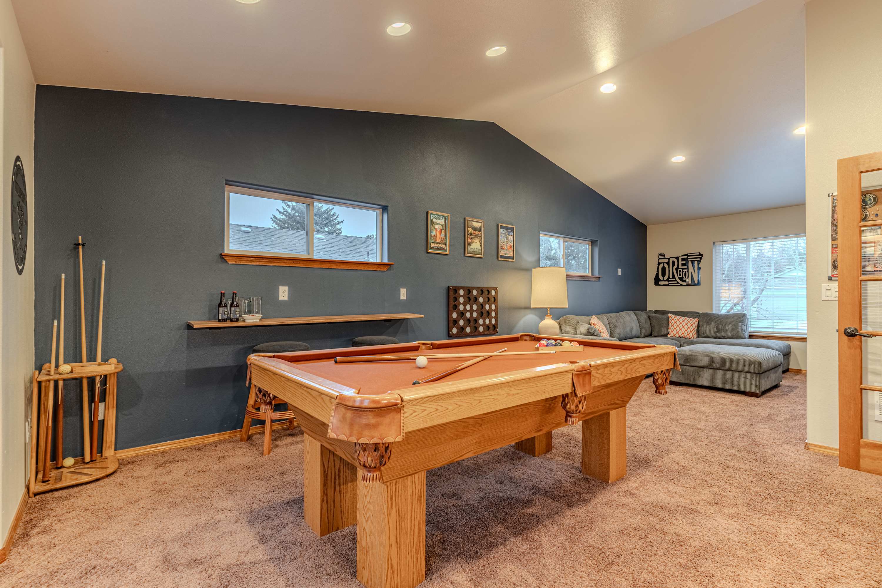 Unleash your competitive side or enjoy a movie night in the game room!