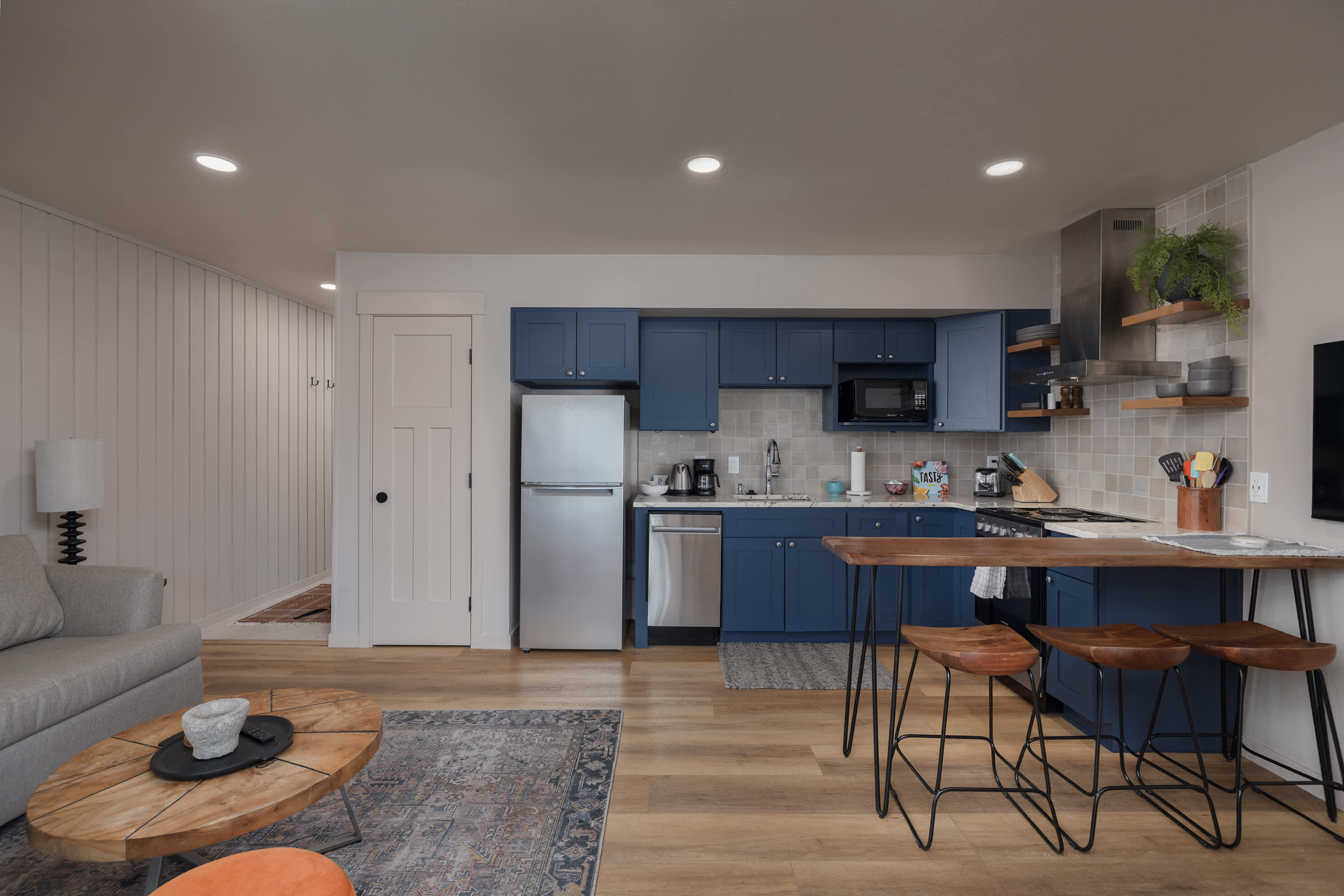 The open kitchen offers ample space & all the comforts of home