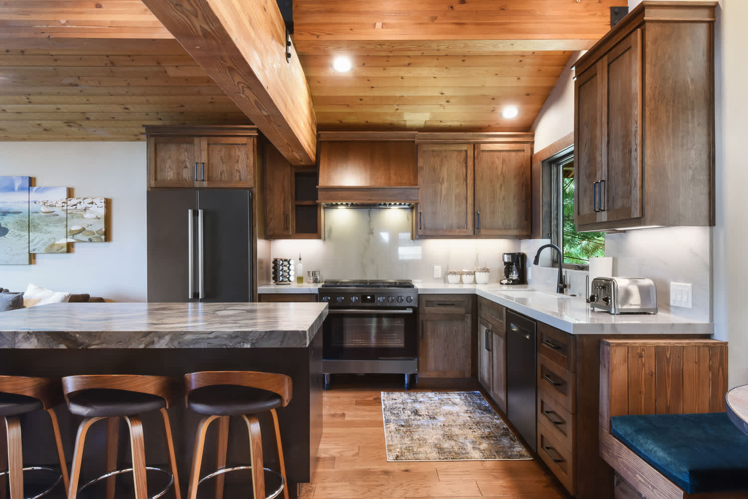 Full kitchen with drip coffee maker, microwave, dishwasher and more