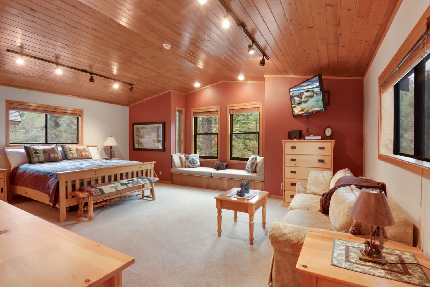 Large primary bedroom with Smart TV, and private en-suite