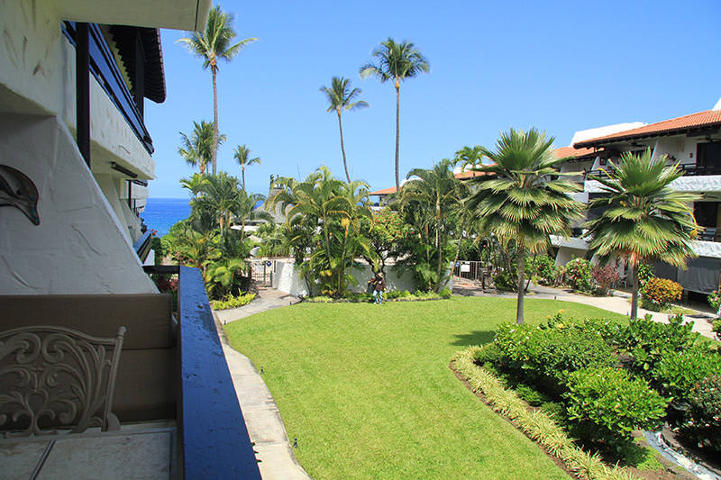 Lanai with courtyard & partial ocean view