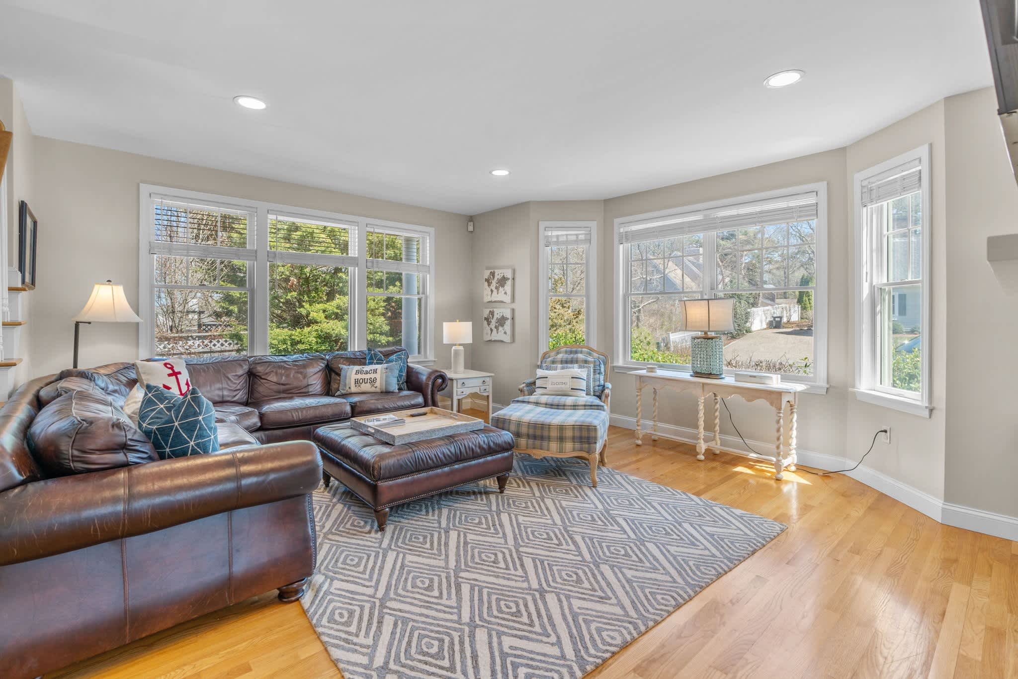 Curl up by the living room fireplace & stream your favorites on the smart TV