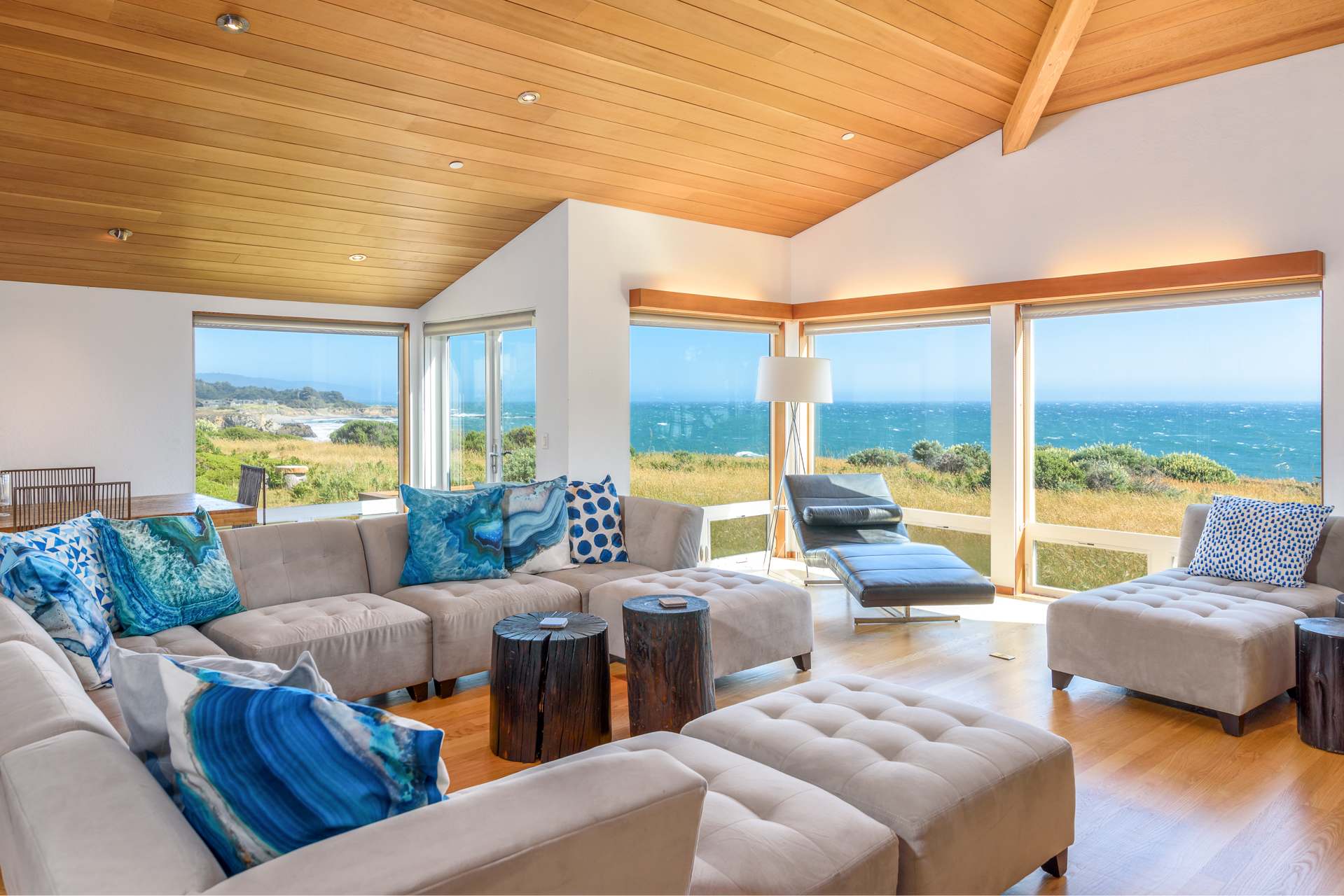 Ocean view living room w/ Smart TV and gas fireplace