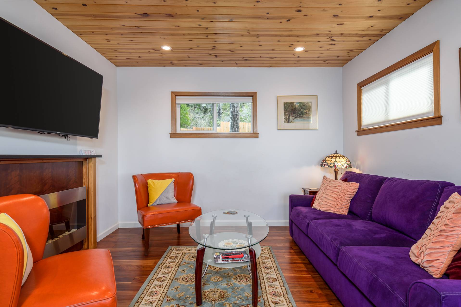 Cozy living space with sofa sleeper, and Smart TV