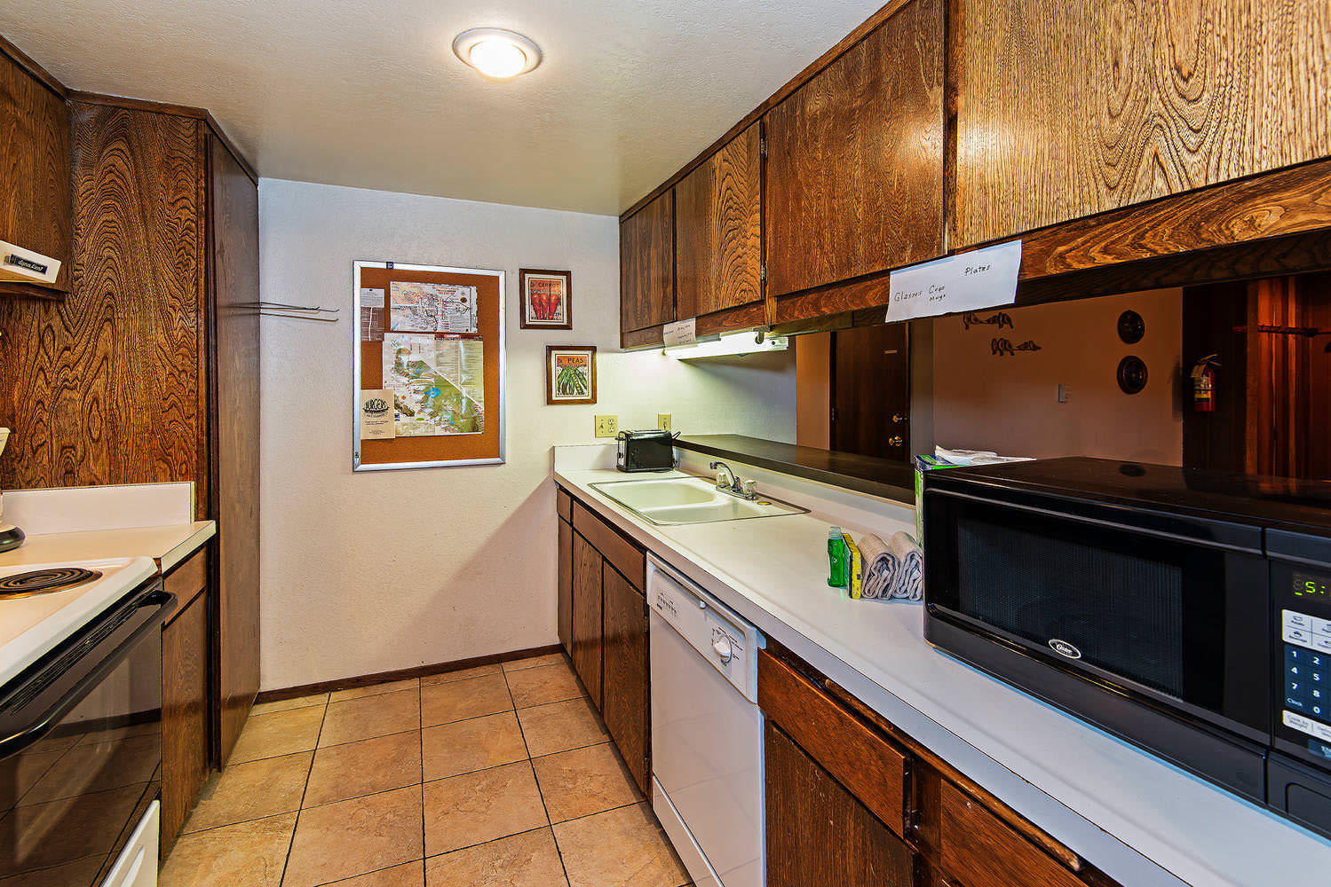 Kitchen w/ slow cooker, blender, toaster, drip coffee pot, pots/pans and more