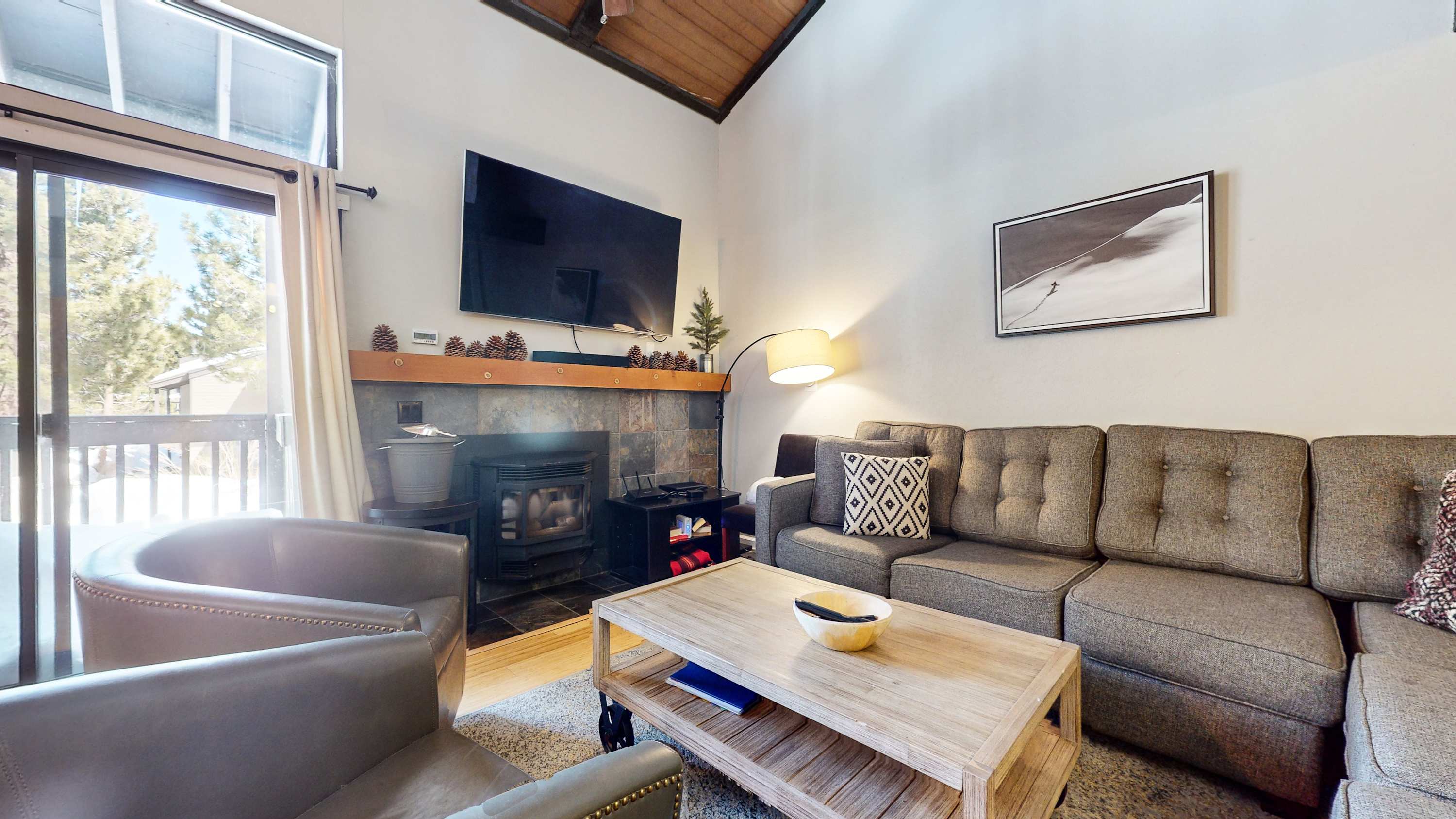 Cozy and spacious living area with TV