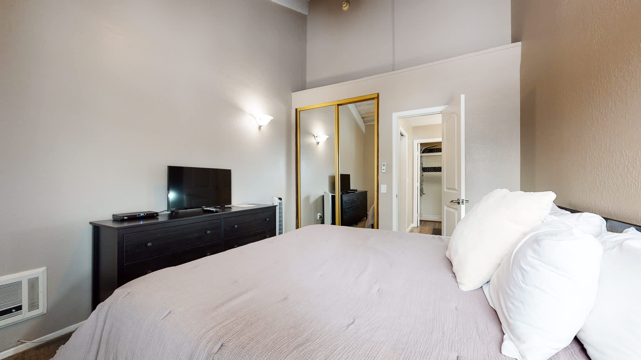 Bedroom 1 with King bed, and en suite (main floor)