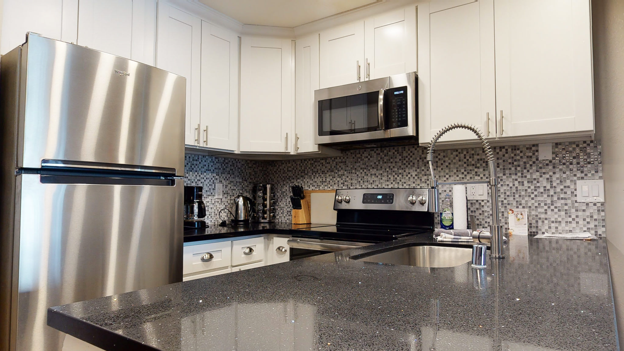 Full kitchen with stainless-steel appliances