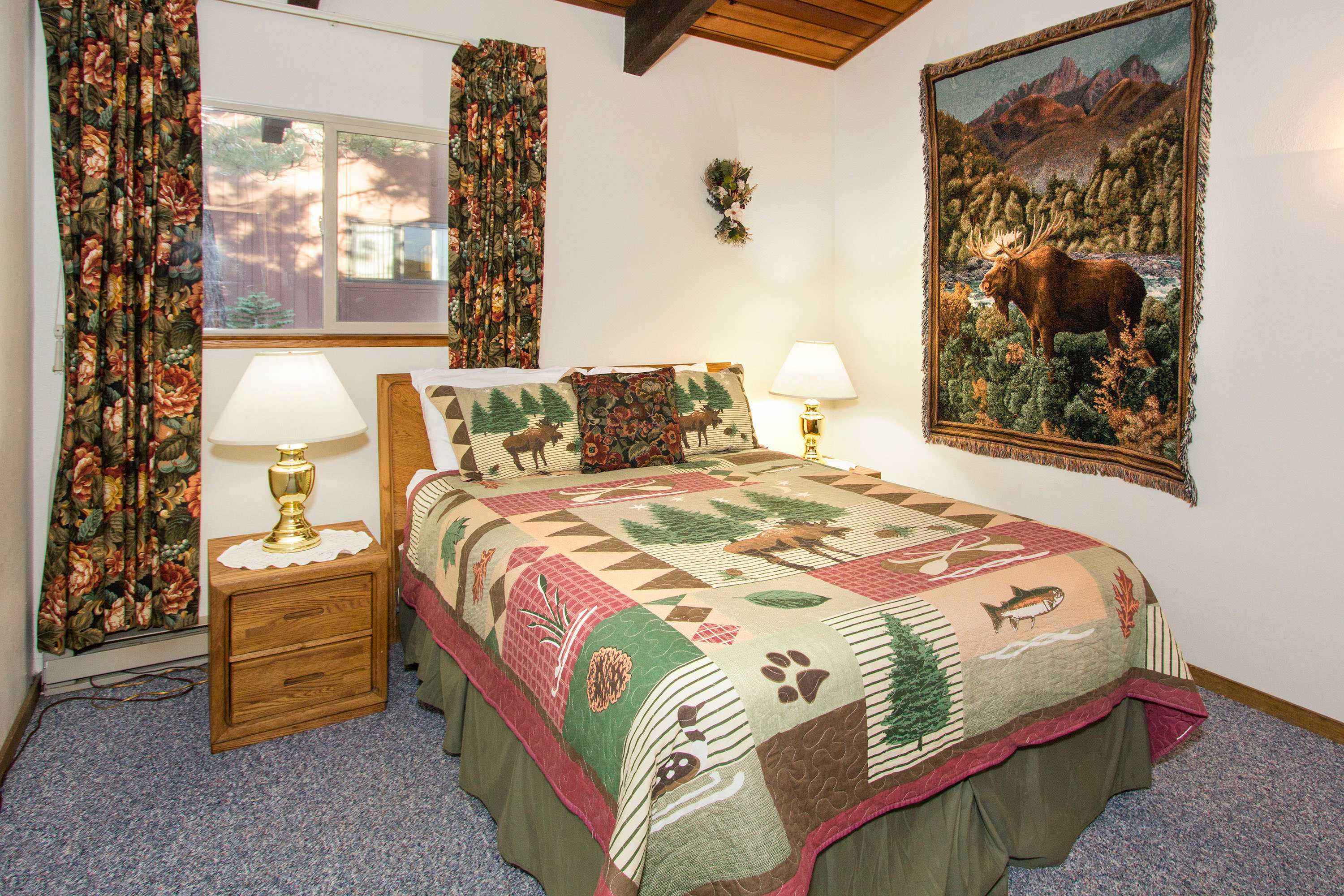 1st bedroom: Queen bed with TV (2nd floor)