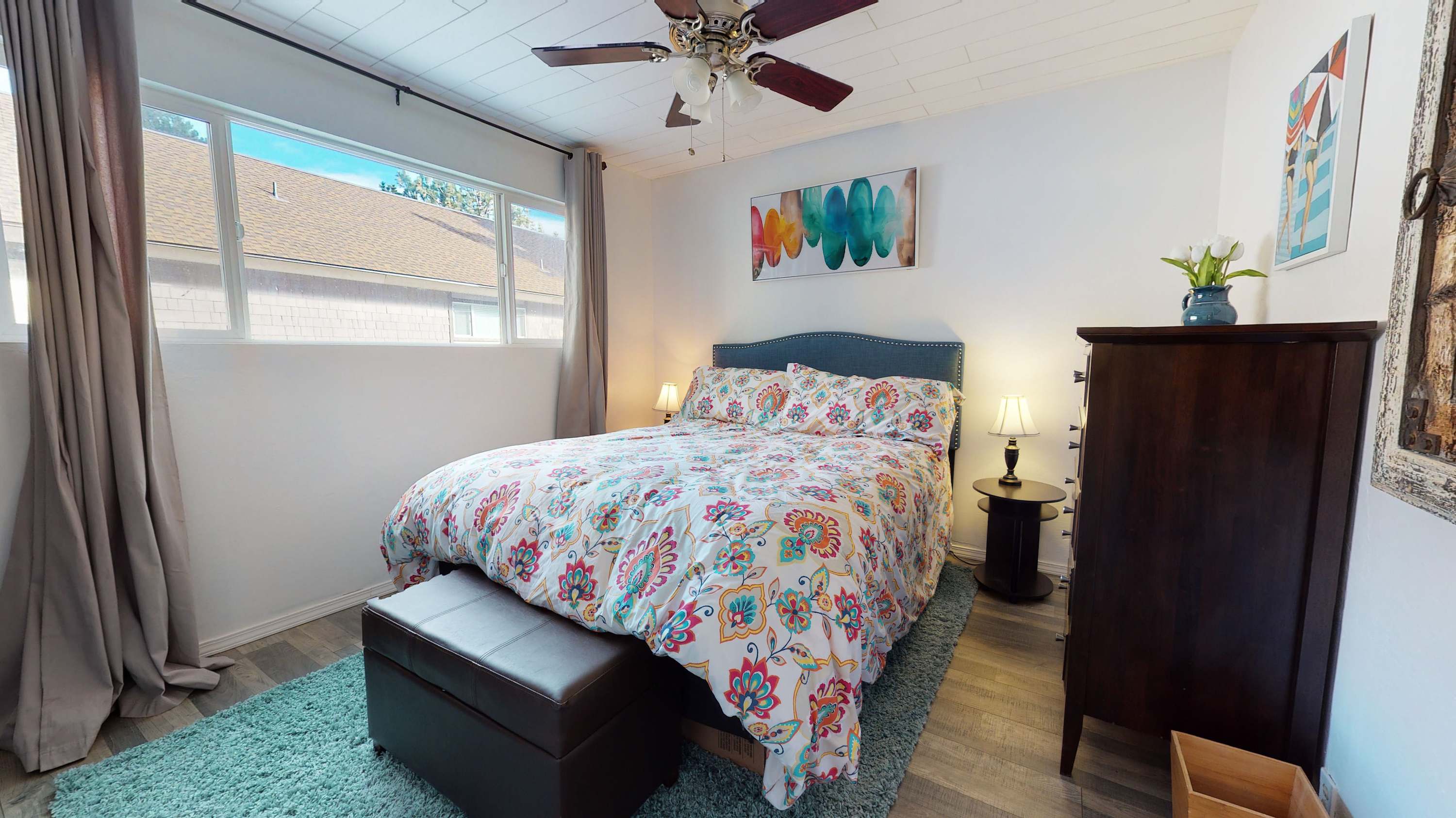 Queen bed in bedroom