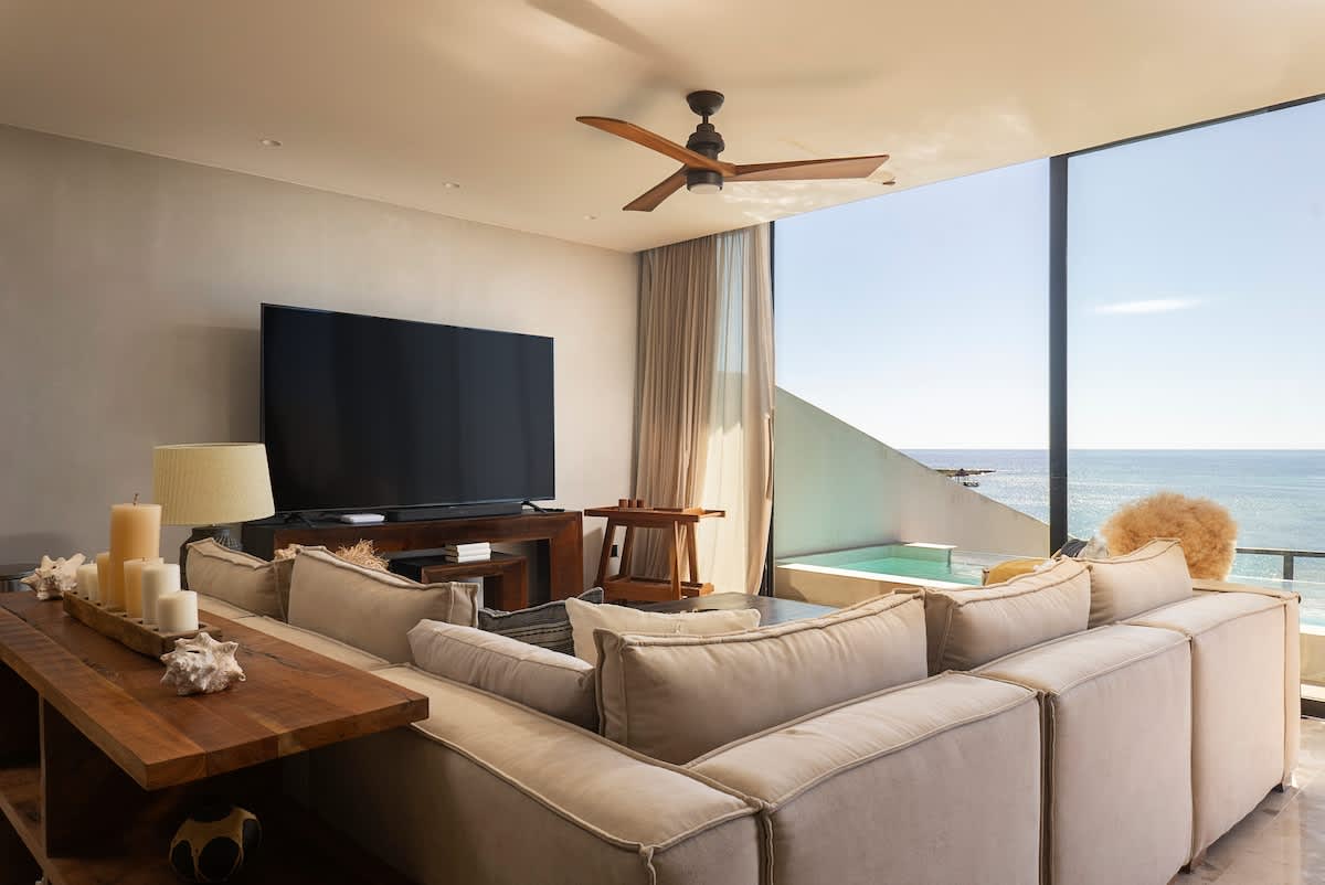 Beautiful and modern living room with a TV.