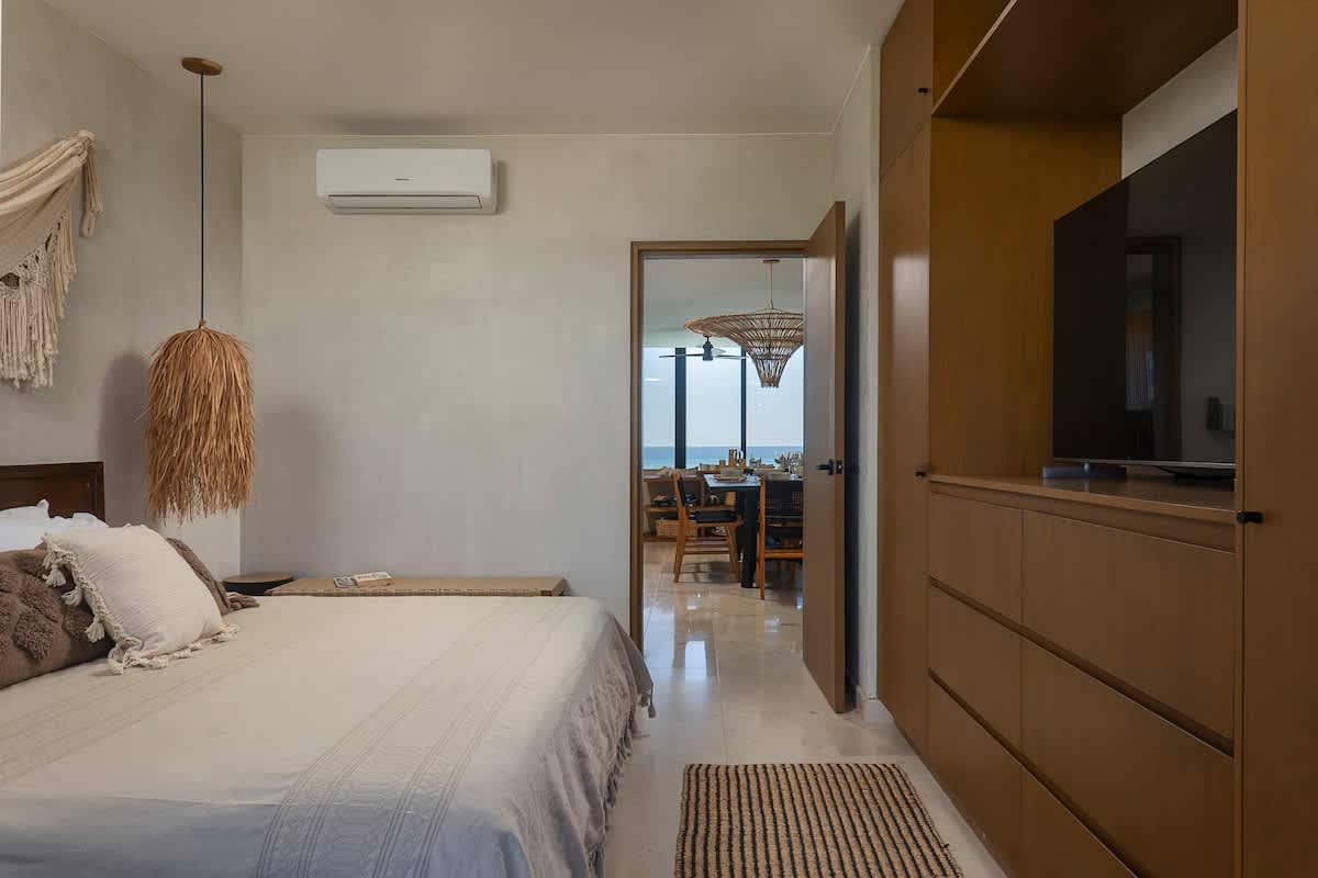 Lovely bedroom featuring with a luxurious king-size bed