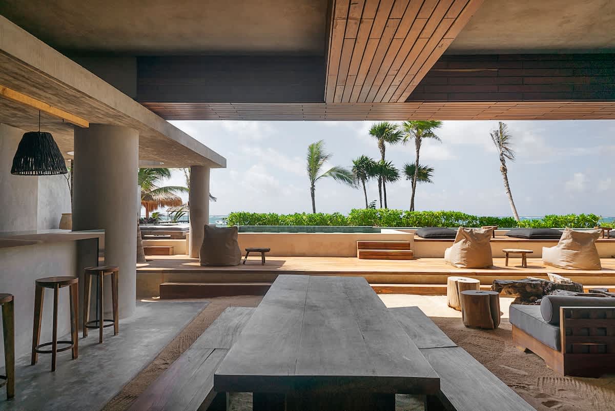 Communal sitting area in front of the pool, just steps away from the sea