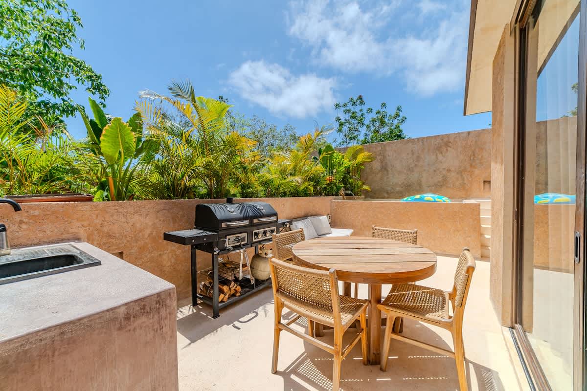 Spacious rooftop terrace surrounded by nature, perfect for morning coffee or evening gatherings.