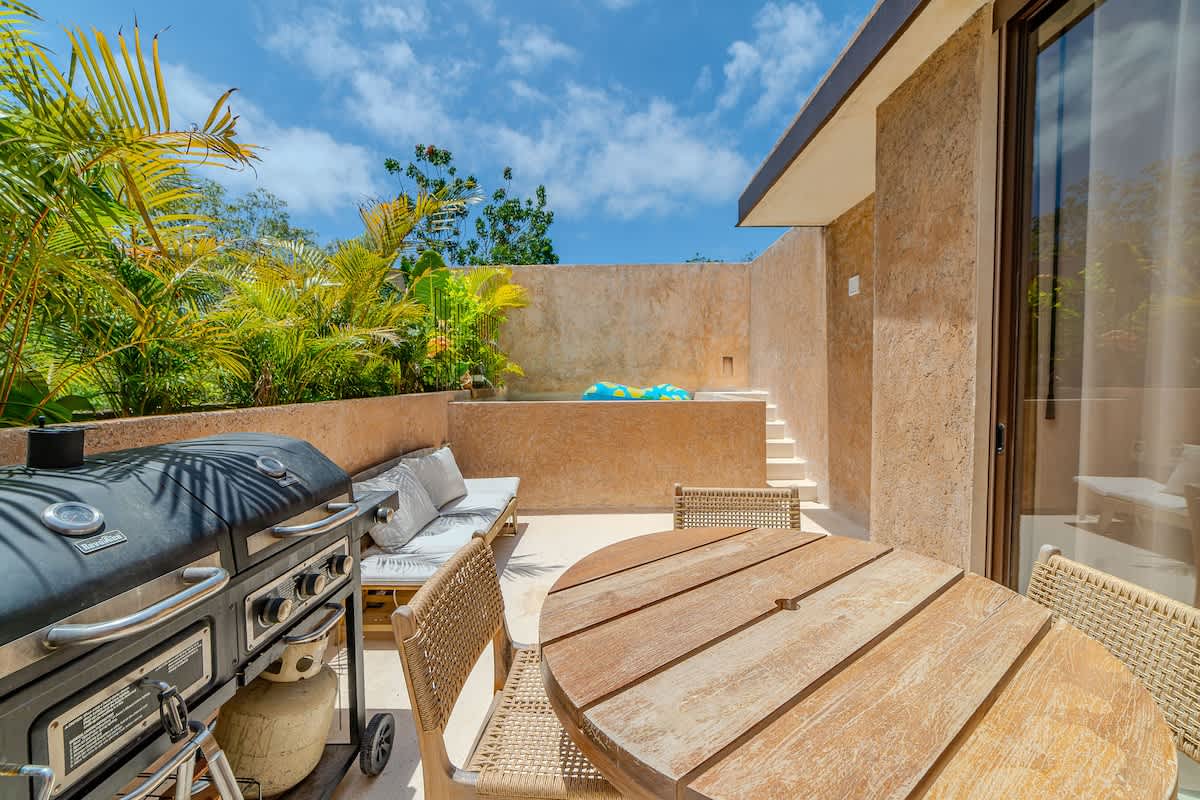 Spacious rooftop terrace surrounded by nature, perfect for morning coffee or evening gatherings.