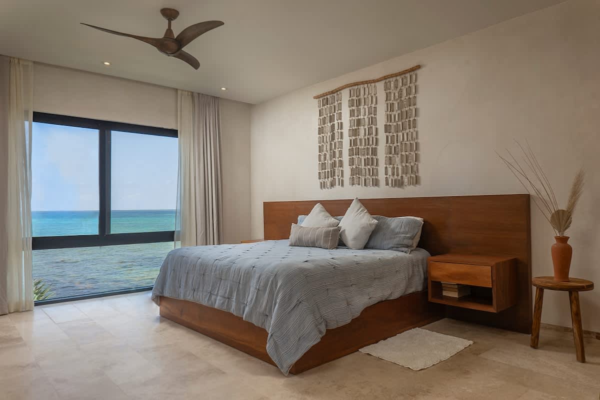 Bedroom #4 features two comfortable king-size beds and beautiful ocean views, creating the perfect relaxing retreat.
