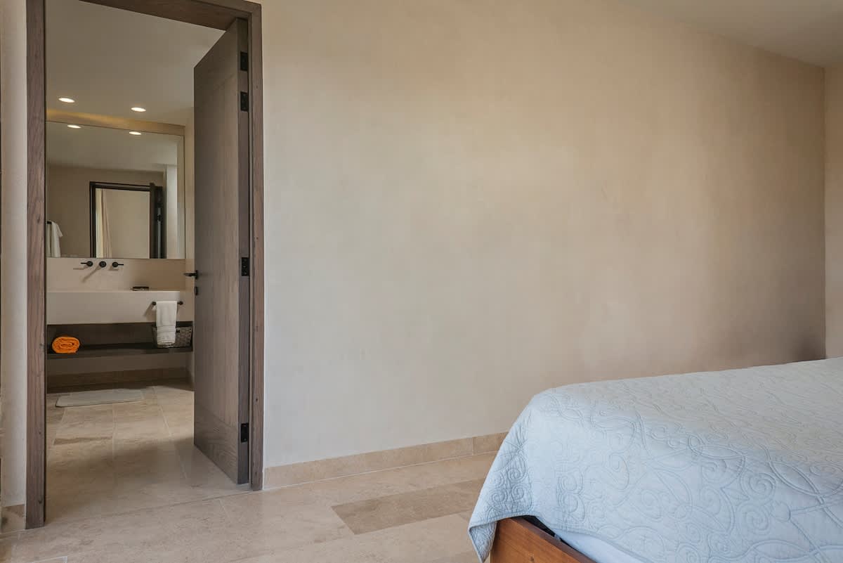 Bedroom #4 features two comfortable king-size beds and beautiful ocean views, creating the perfect relaxing retreat.

