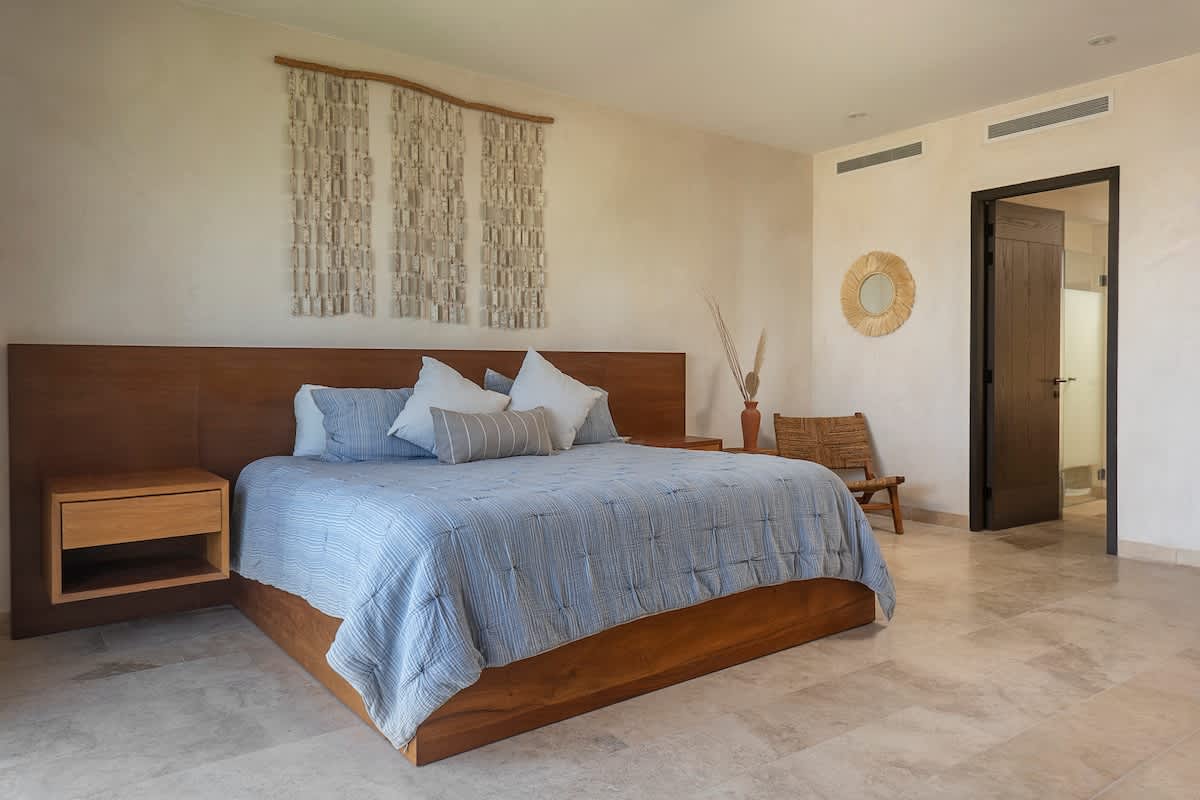 Bedroom #4 features two comfortable king-size beds and beautiful ocean views, creating the perfect relaxing retreat.

